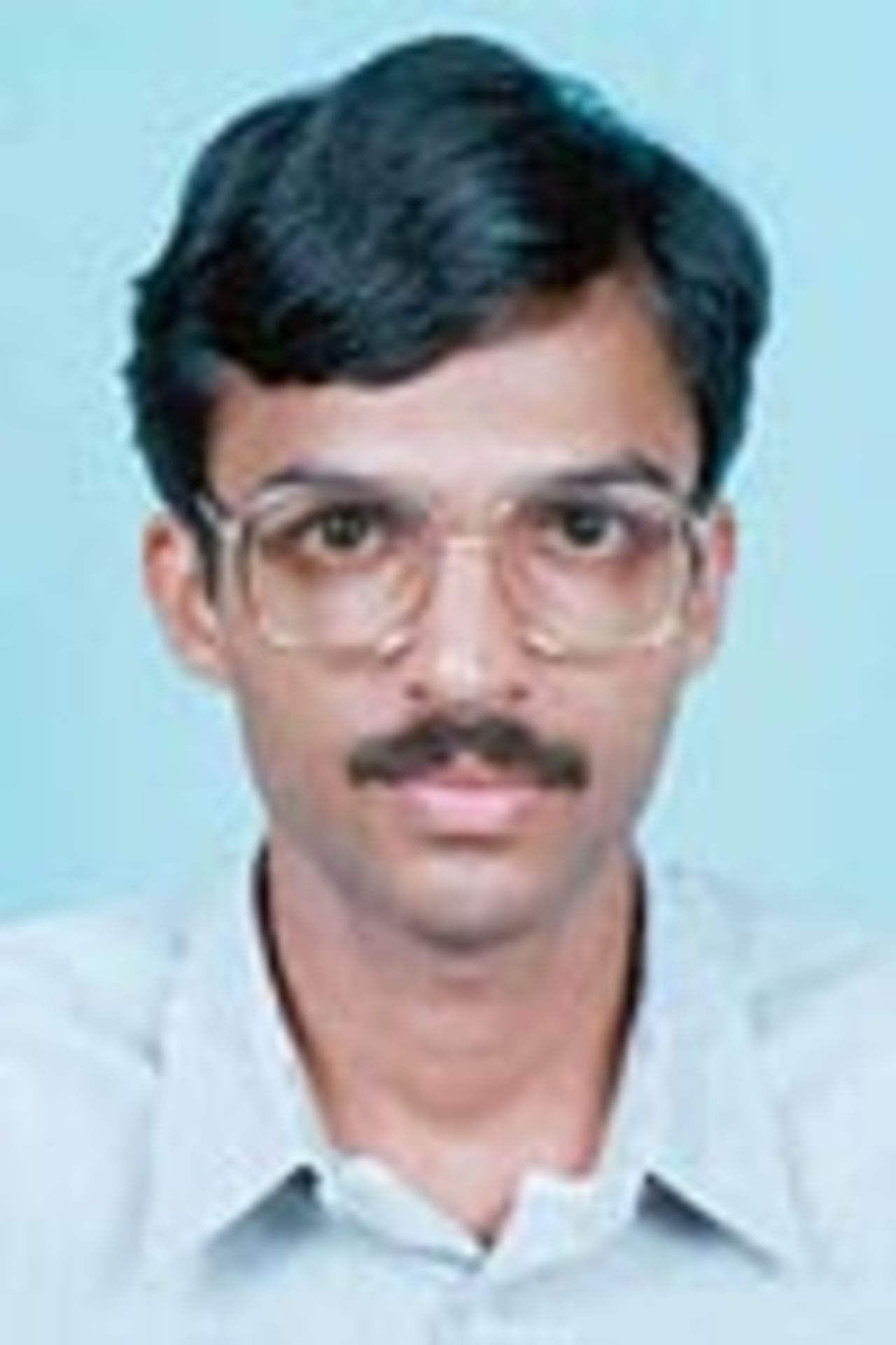 KA Mohanan, Umpire, Portrait