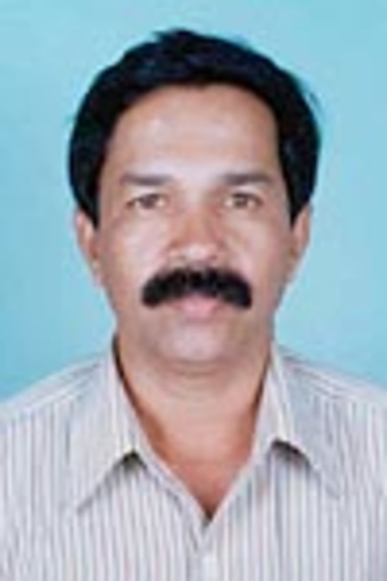 B Nanda Kumar, Umpire, Portrait
