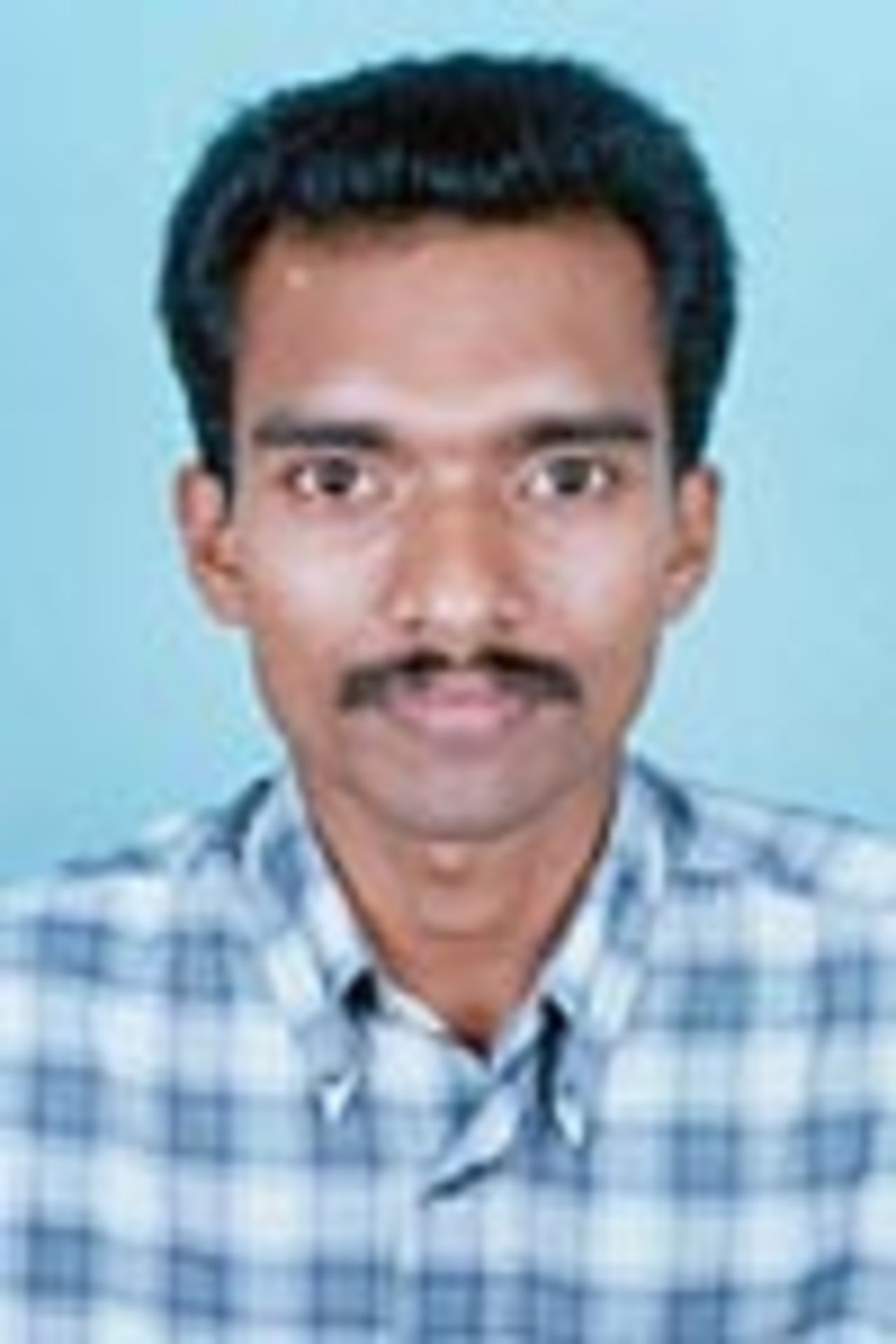 VS Padmakumar, Umpire, Portrait