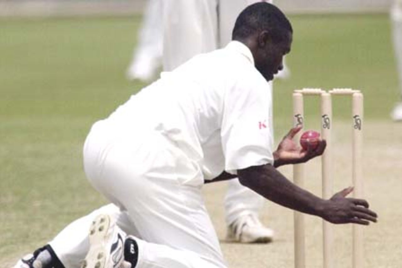 12 Nov 2000: Wavell Hinds of the West Indies takes a return to the stumps in the match between the Western Warriors and the West Indies at the WACA ground in Perth, Australia.
