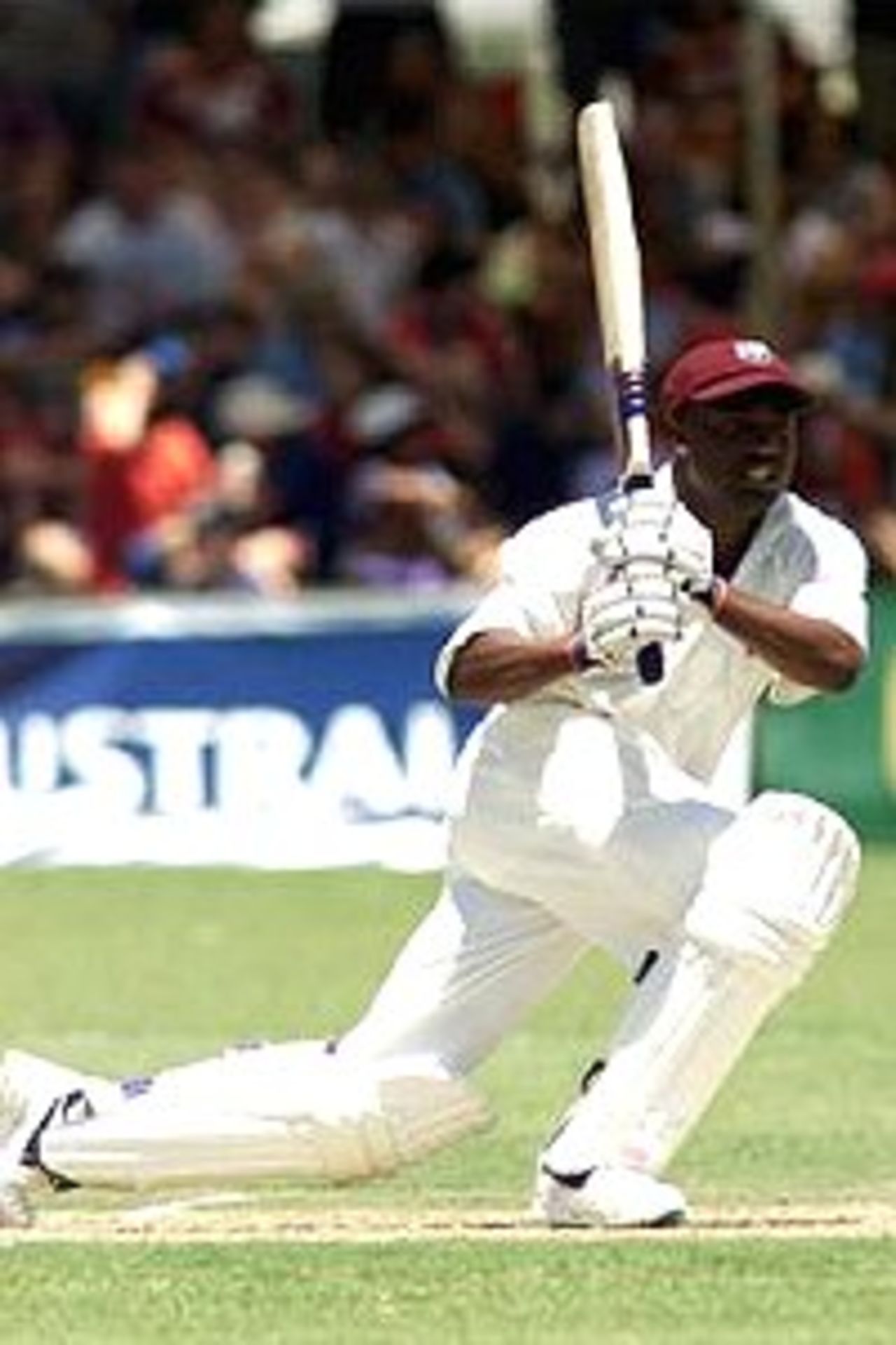 13 Nov 2000: Brian Lara of the West Indies hits out on his way to 106, during the match between the Northern Territory Invitational XI and the West Indies, played at Traeger Park, Alice Springs, Australia.