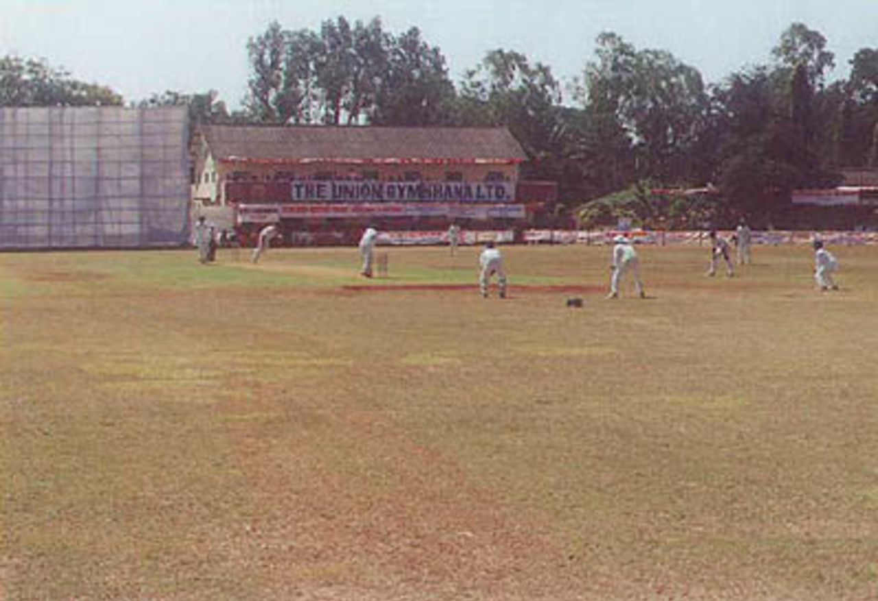 Dodda Ganesh bowls to Venu Gopal Rao from the pavilion end, Ranji Trophy South Zone League, 2000/01, Karnataka v Andhra, Union Gymkhana Ground, Belgaum, 15-18 November 2000. (Day 1).