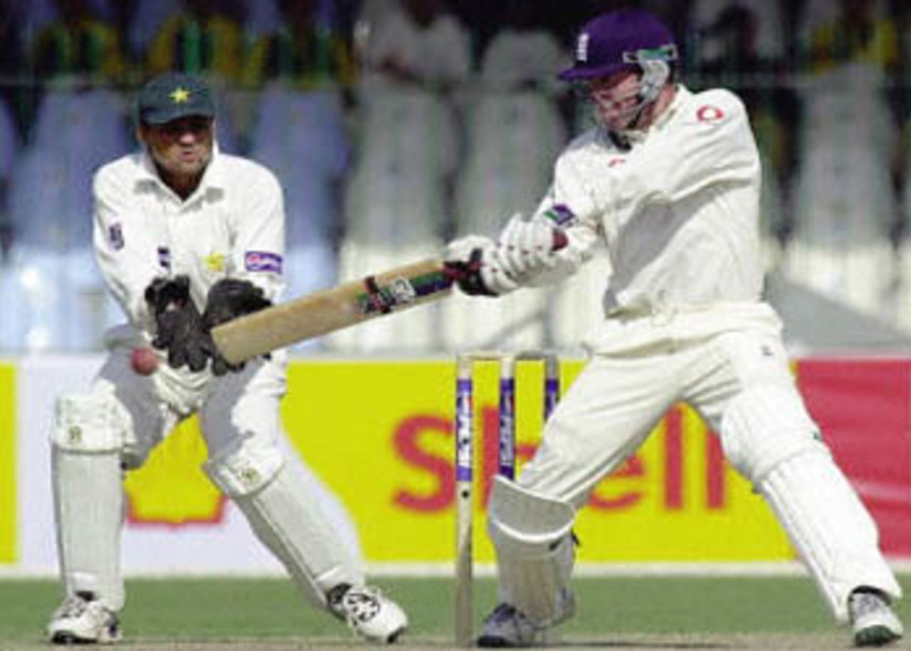 White cuts off the back foot as Moin Khan watches, England in Pakistan, 2000/01, 1st Test, Pakistan v England, Gaddafi Stadium, Lahore, 15-19 November 2000 (Day 2).
