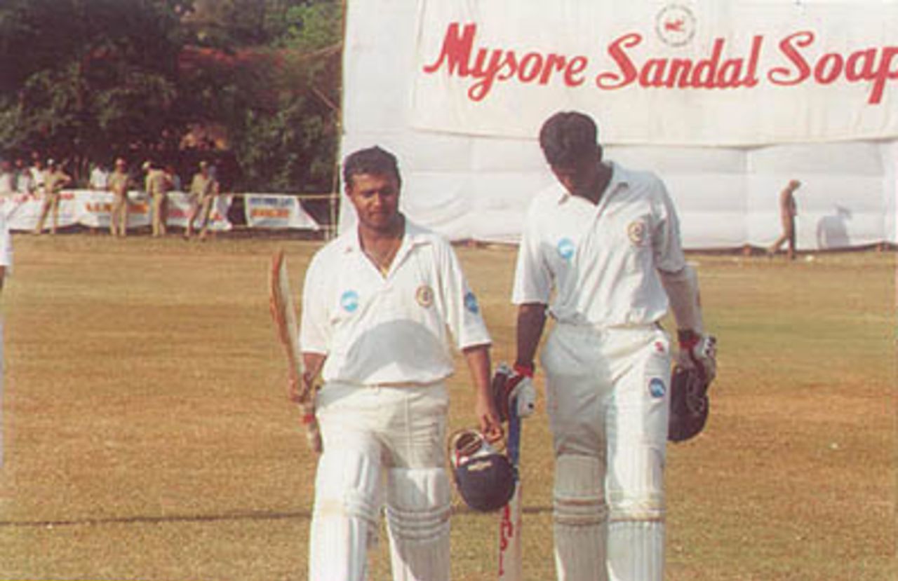 Naidu and Ganesh walk back happily after reaching victory, Ranji Trophy South Zone League, 2000/01, Karnataka v Andhra, Union Gymkhana Ground, Belgaum, 15-18 November 2000 (Day 3).