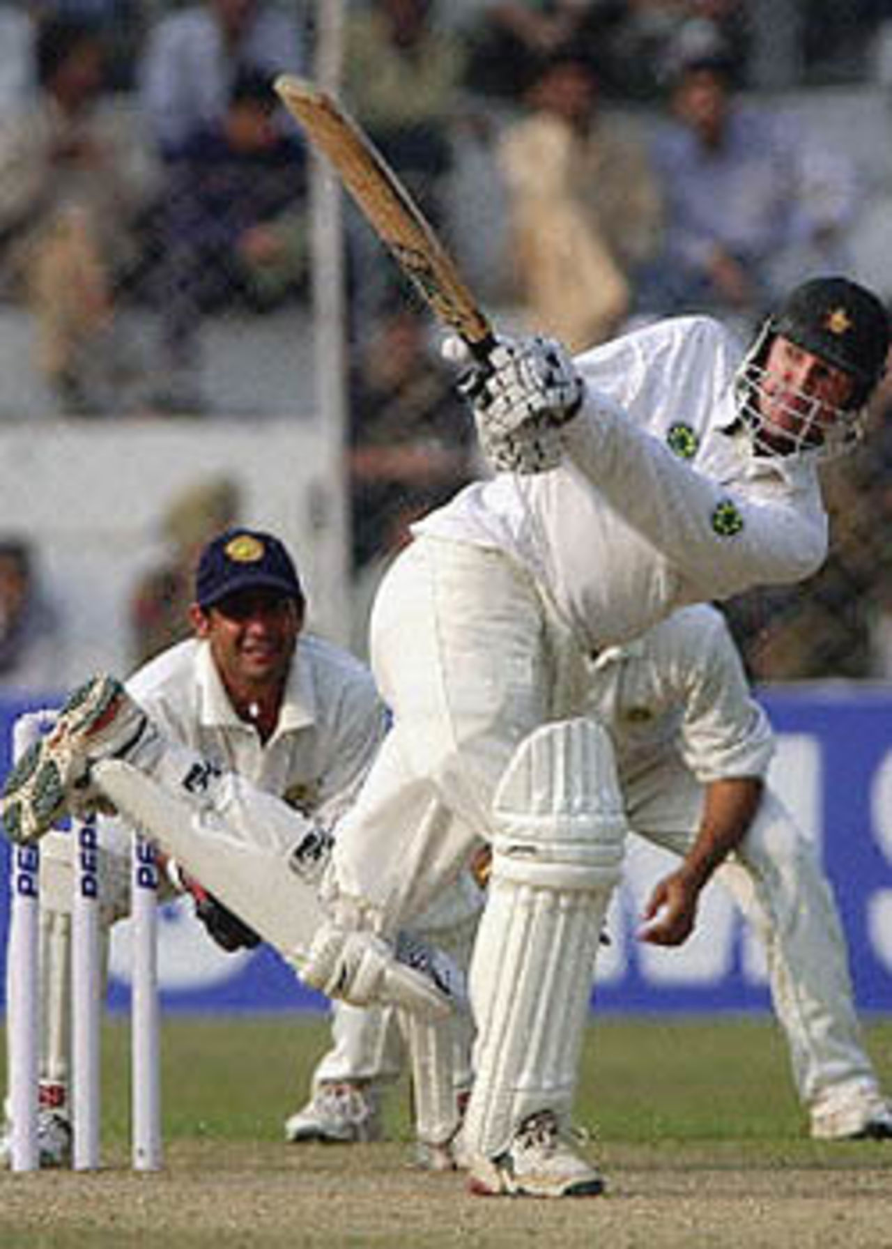Andy Flower plays across the line towards mid wicket, Zimbabwe in India, 2000/01, 1st Test, India v Zimbabwe, Feroz Shah Kotla, Delhi, 18-22 November 2000 (Day 1).