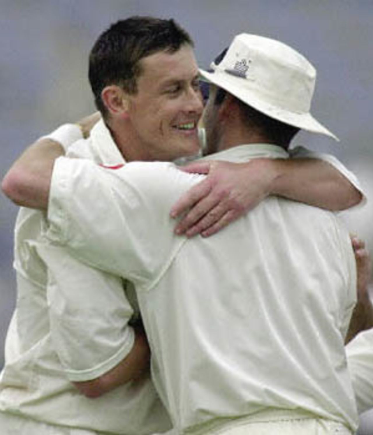 Ashley Giles being congratulated by Graham Thorpe, England in Pakistan, 2000/01, 1st Test, Pakistan v England, Gaddafi Stadium, Lahore, 15-19 November 2000 (Day 3).
