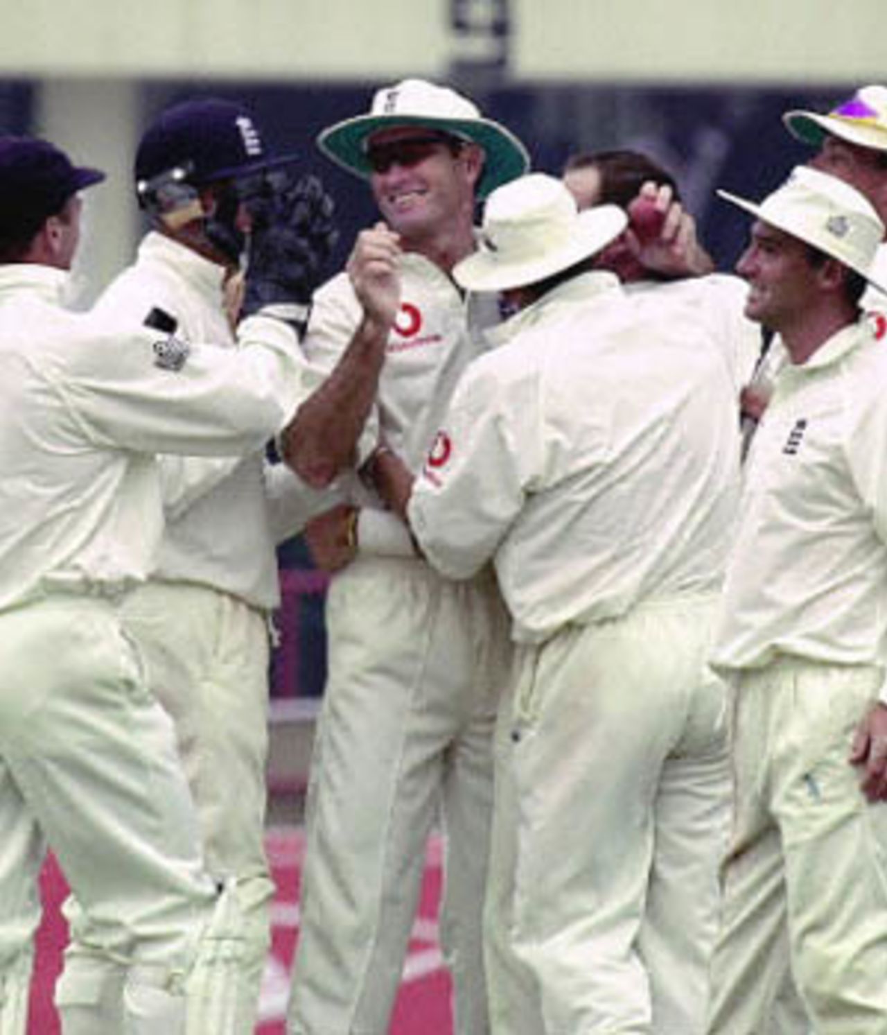 Graeme Hick being congratulated after taking the catch of Qaisar Abbas, England in Pakistan, 2000/01, 1st Test, Pakistan v England, Gaddafi Stadium, Lahore, 15-19 November 2000 (Day 4).