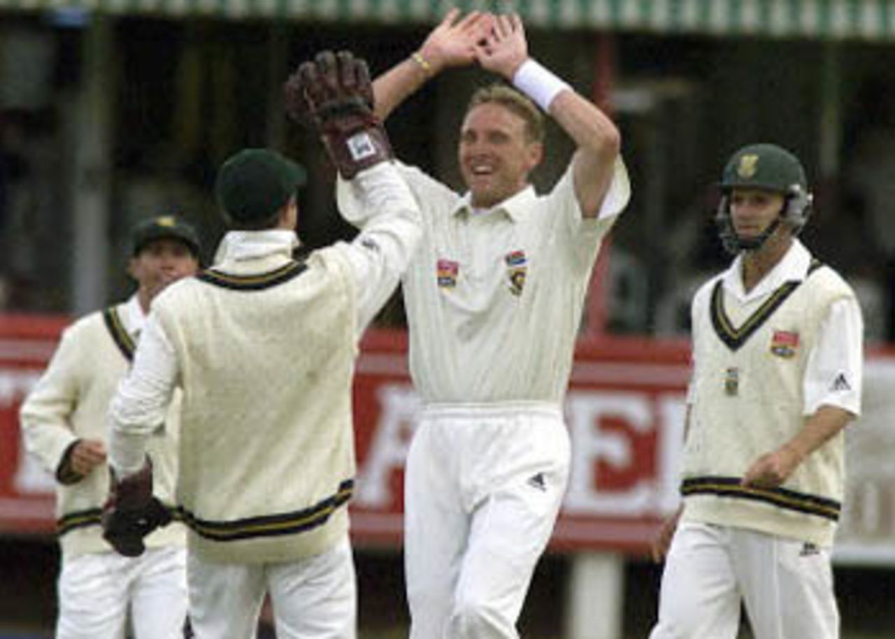 Donald celebrates the fall of Richardson with Boucher, New Zealand in South Africa, 2000/01, 1st Test, South Africa v New Zealand, Goodyear Park, Bloemfontein, 17-21 November 2000 (Day 2).