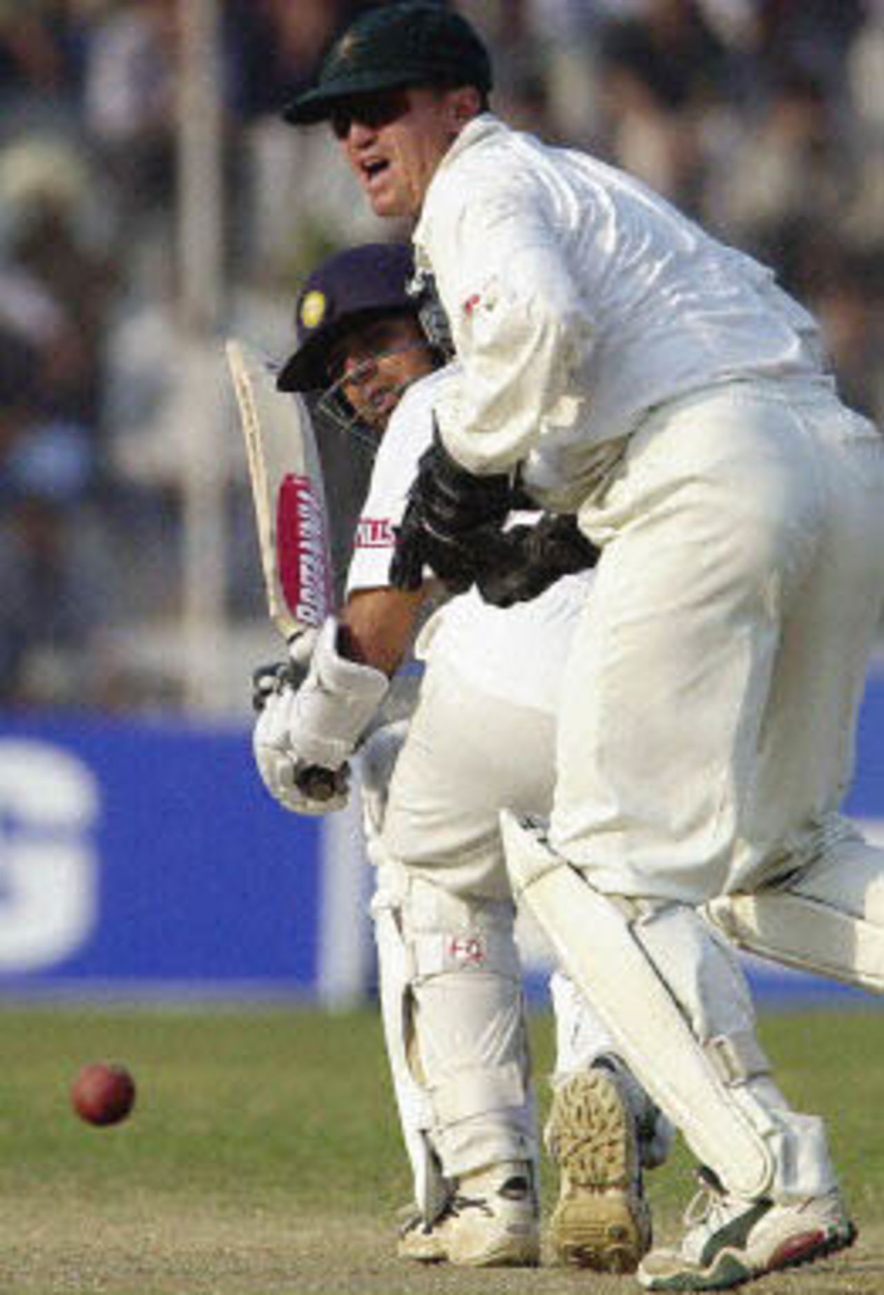 Rahul Dravid flicks the ball from Grant Flower as Andy Flower watches, Zimbabwe in India, 2000/01, 1st Test, India v Zimbabwe, Feroz Shah Kotla, Delhi, 18-22 November 2000 (Day 3).