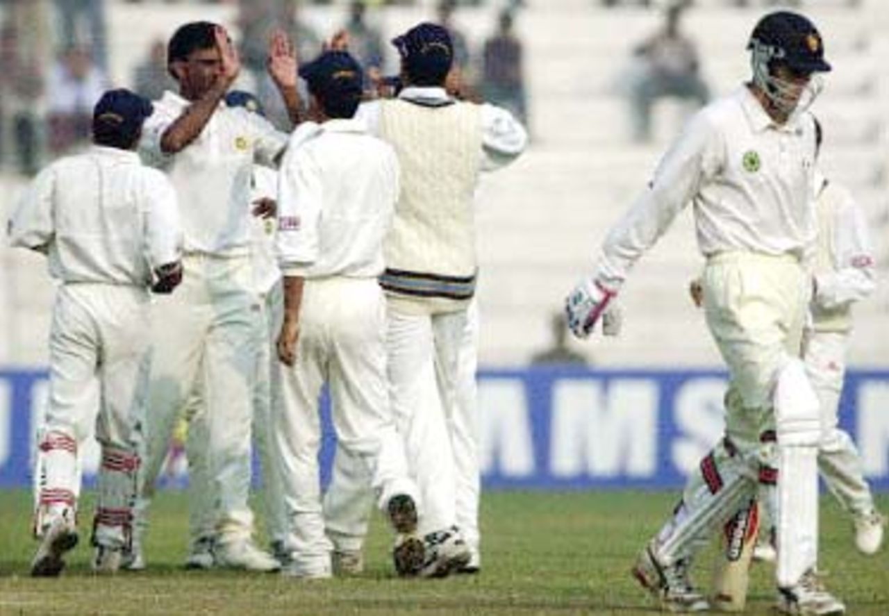 Indians celebrate the fall of Brian Murphy. Zimbabwe in India 2000/01, 1st Test, India v Zimbabwe Feroz Shah Kotla, Delhi, 18-22 November 2000 (Day 5)