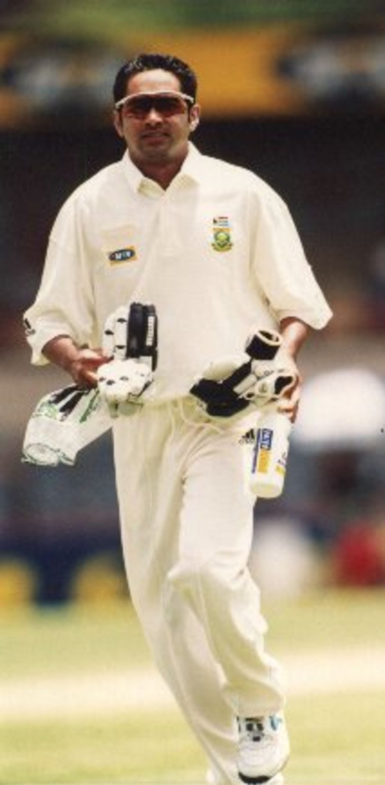 Shafiek Abrahams acts as 12th man in the 1st Test between South Africa and New Zealand Nov 2000