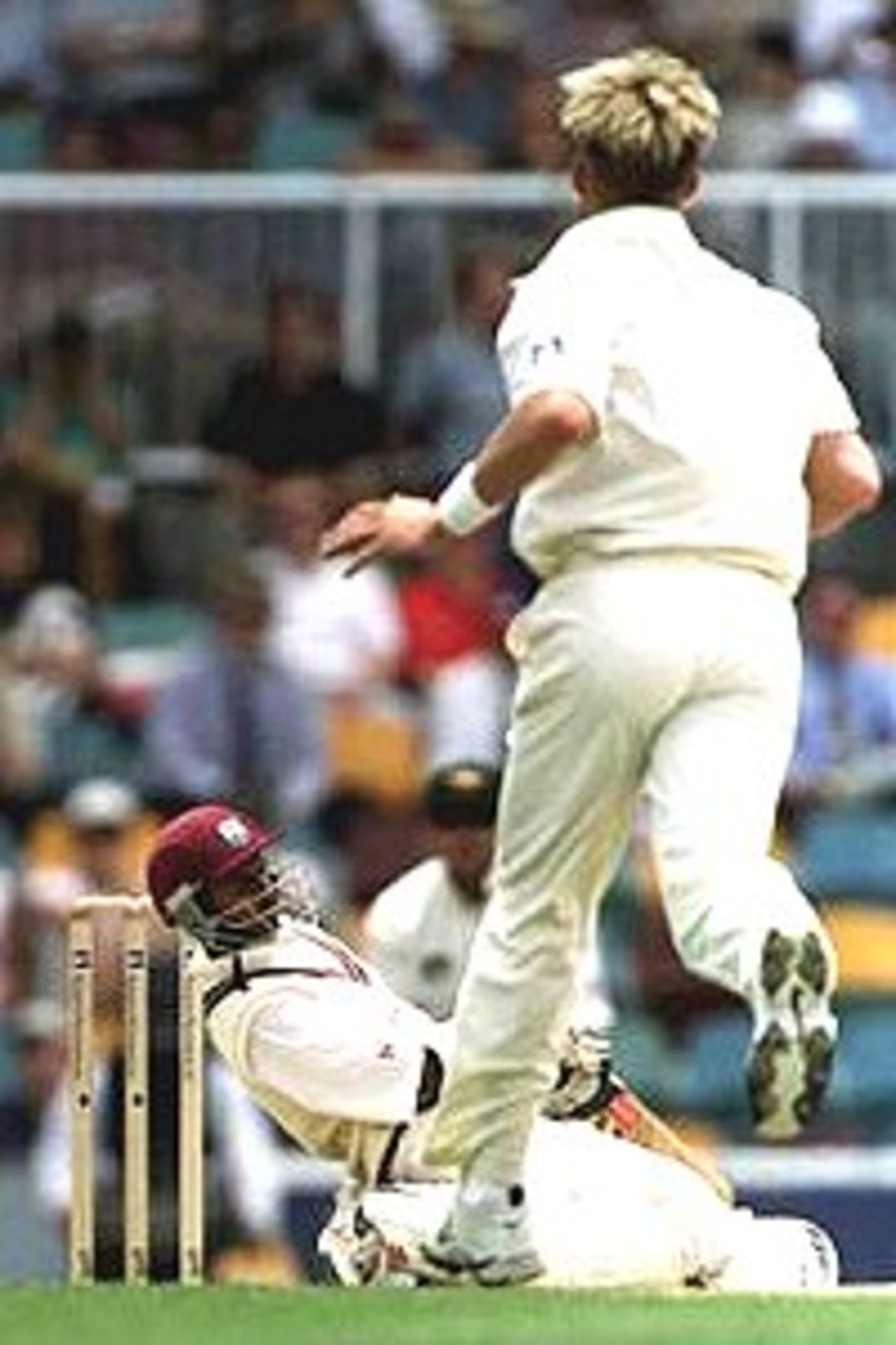 Shivnarine Chanderpaul of the West Indies is felled by a bouncer from Brett Lee of Australia as West Indies collapse to 82 all out during the first days play of the First Test Match between Australia and the West Indies at The Gabba cricket ground, Brisbane, Australia.