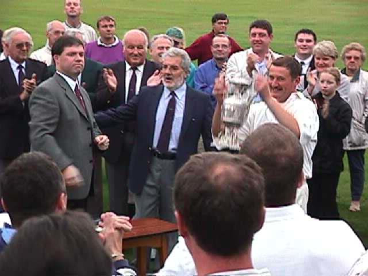 Neal Wilkinson receives the trophy