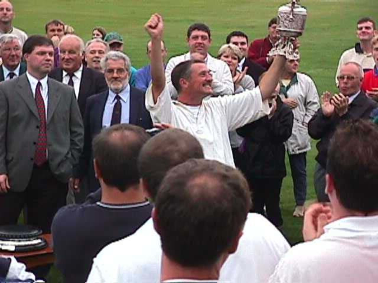 Neal Wilkinson holds the trophy aloft