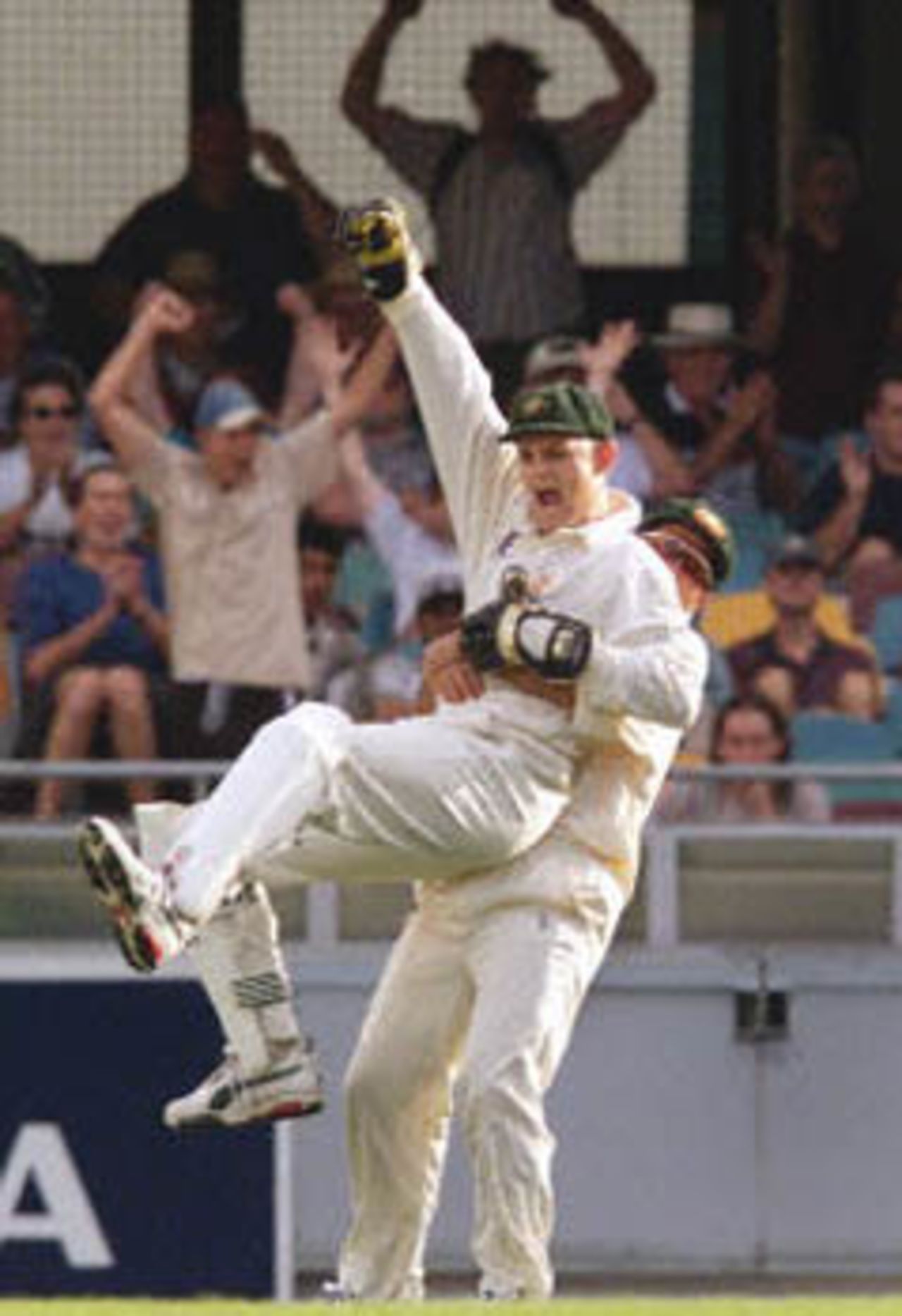 Ponting hugs Gilchrist after dismissing Lara, The Frank Worrell Trophy, 2000/01, 1st Test, Australia v West Indies, Brisbane Cricket Ground, Woolloongabba, Brisbane, 23-27 November 2000 (Day 2).