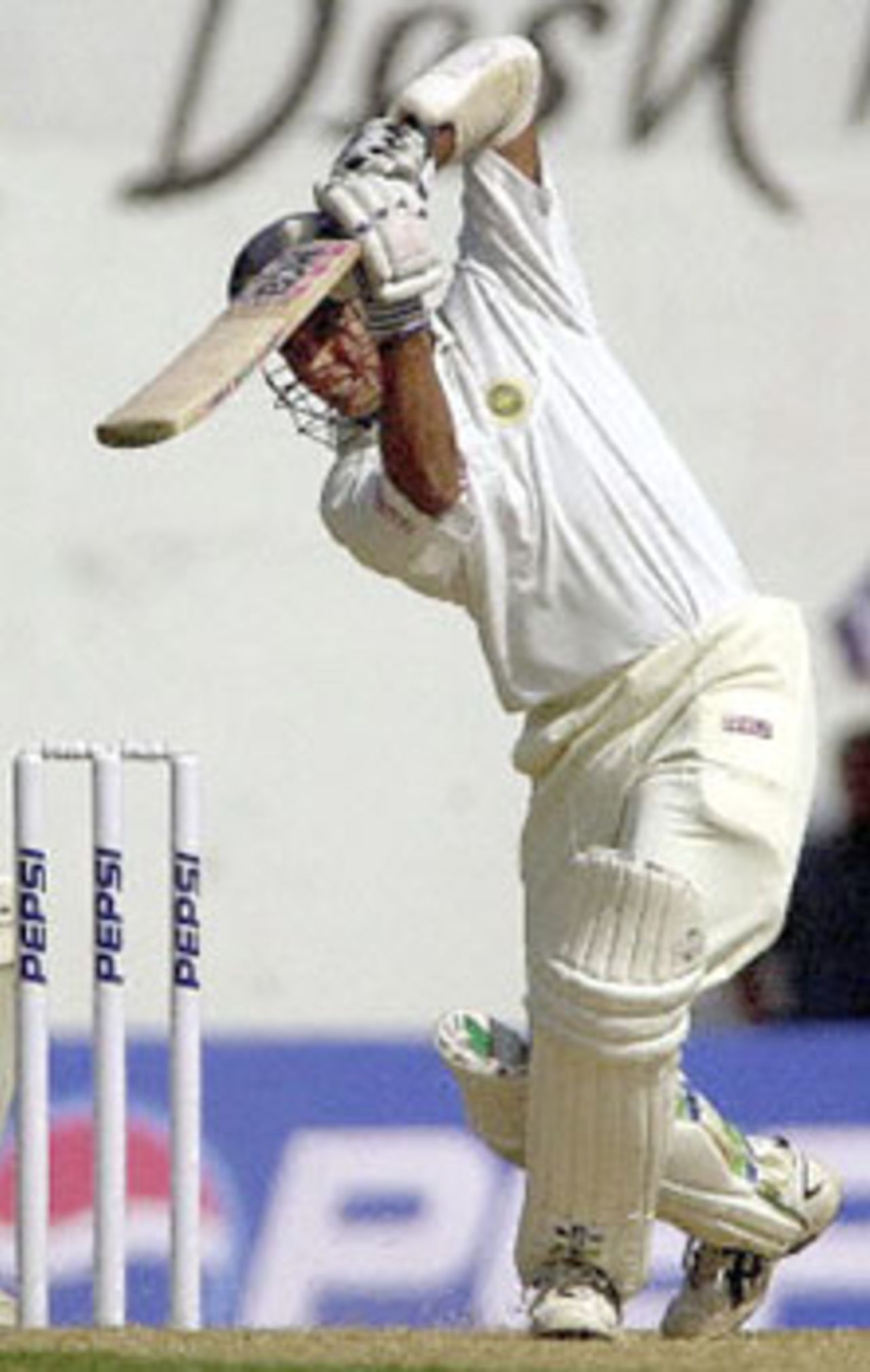 Indian batsman S.S Das drives a delivery from Zimbabwean bowler Henry Olonga on the first day of the second test match between India and Zimbabwe in Nagpur, 25 November 2000. Das was unbeaten on 35 as India made 91 for 1 by lunch. India leads Zimbabwe 1-0 in the two test series.