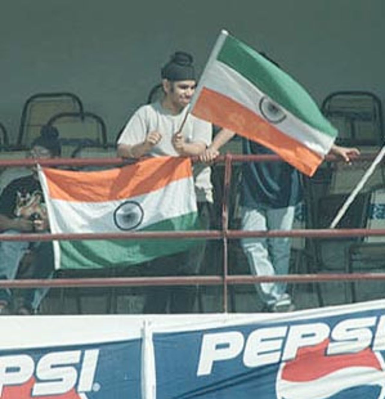 An Indian fan with the Tri-colour in the stands. Zimbabwe in India 2000/01, 2nd Test, India v Zimbabwe Vidarbha C.A. Ground, Nagpur, 25-29 November 2000 (Day 2)