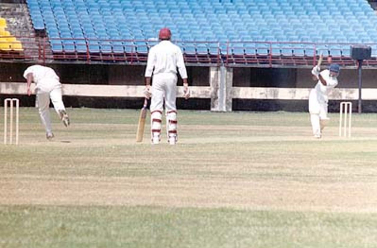 S Nair drives through long off to a ball from Aware, Ranji Trophy South Zone League, 2000/01, Kerala v Goa, Nehru Stadium, Kochi, 15-18 November 2000.