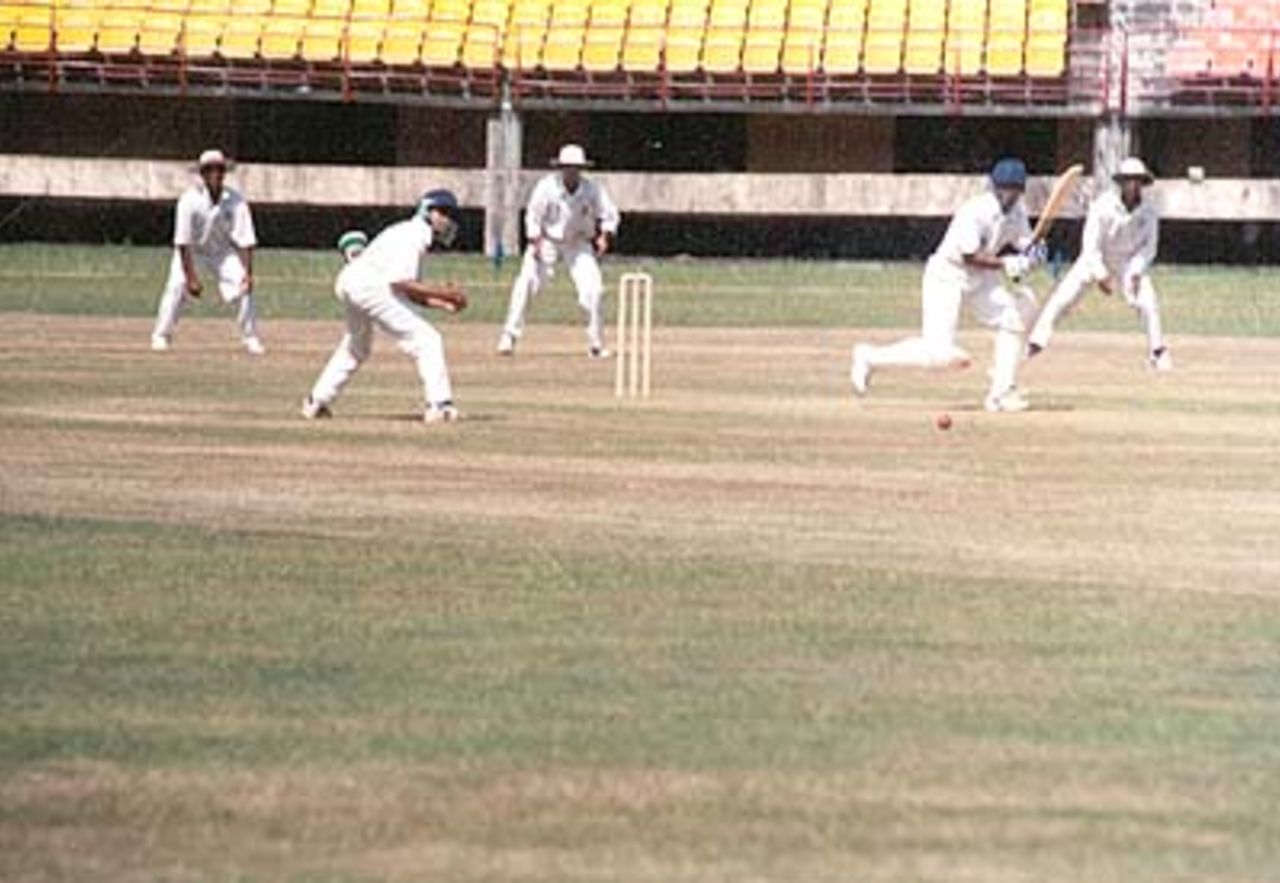 Aware being flicked by S Nair, Ranji Trophy South Zone League, 2000/01, Kerala v Goa, Nehru Stadium, Kochi, 15-18 November 2000.