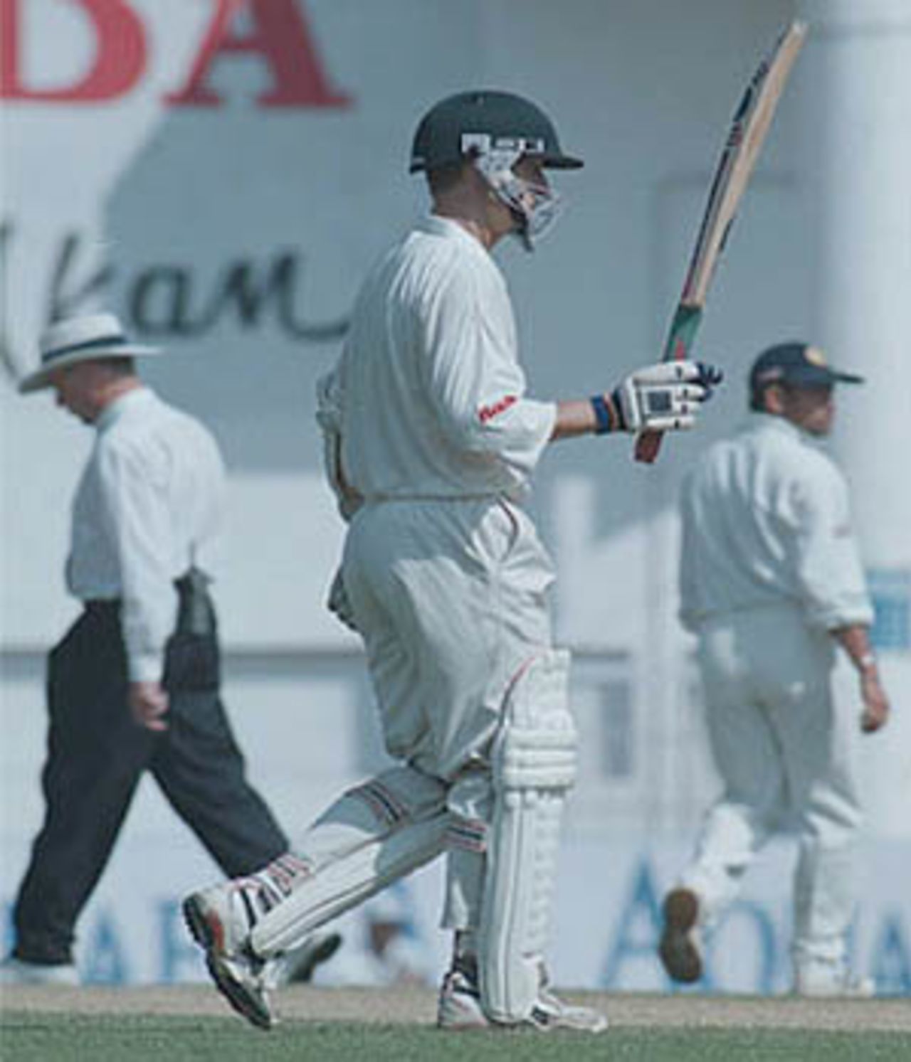 Carlisle acknowledges the crowd with a raised bat after his half-century, Zimbabwe in India, 2000/01, 2nd Test, India v Zimbabwe, Vidarbha C.A. Ground, Nagpur, 25-29 November 2000 (Day 3).