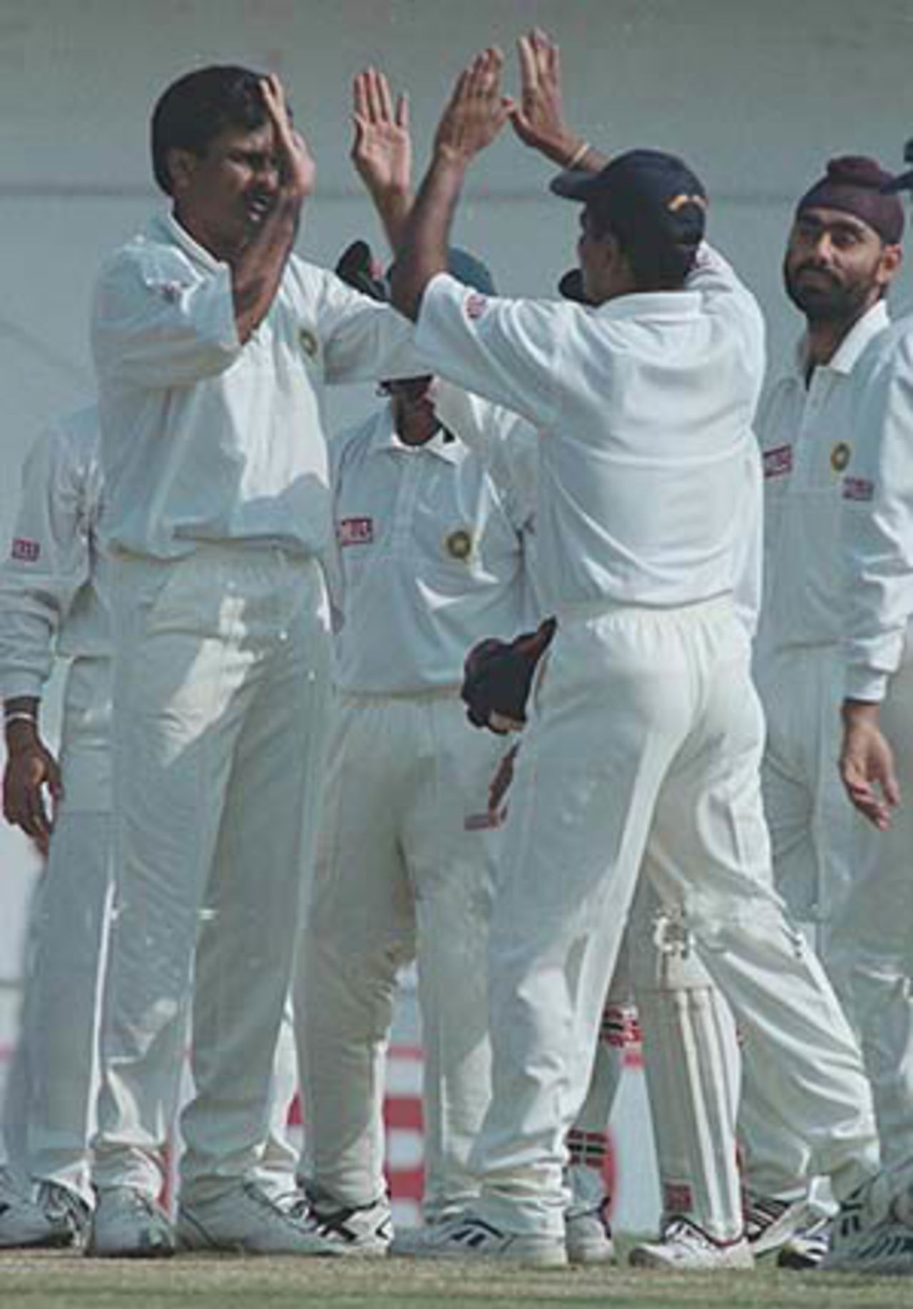 Srinath being congratulated by Sunil Joshi, Zimbabwe in India, 2000/01, 2nd Test, India v Zimbabwe, Vidarbha C.A. Ground, Nagpur, 25-29 November 2000 (Day 4).