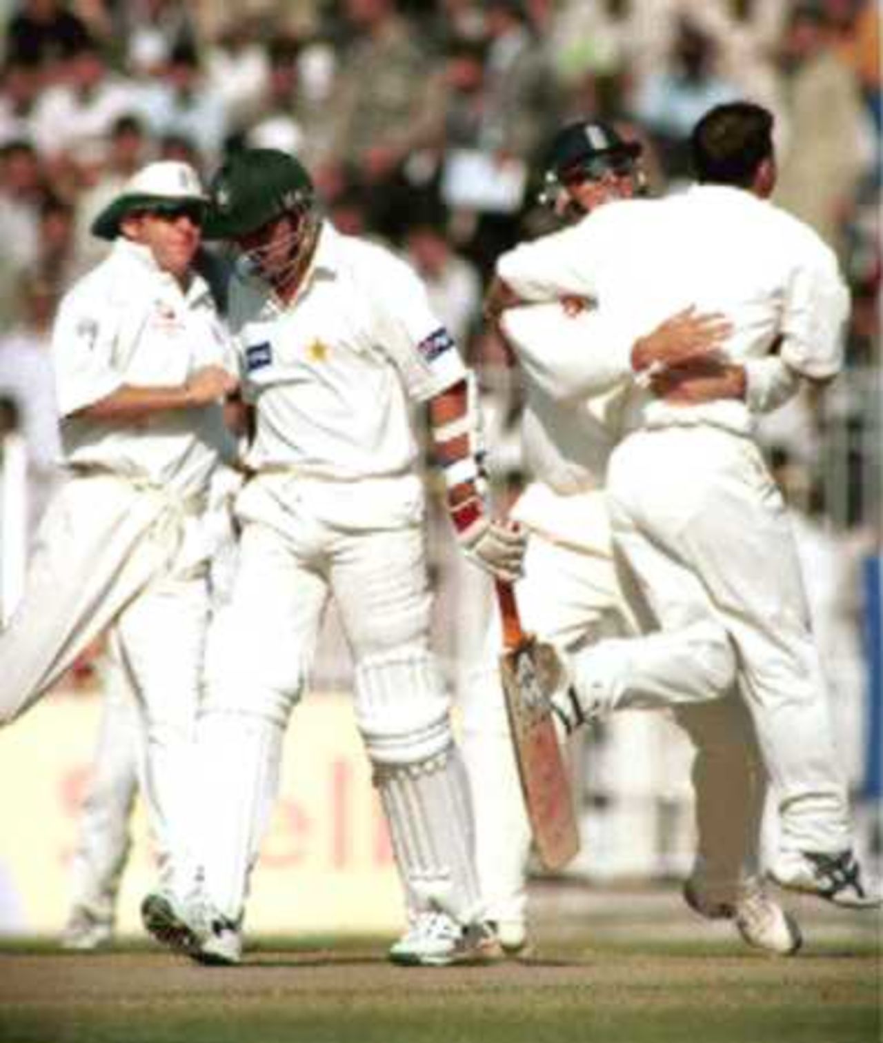 Shahid Afridi walking away as he is caught by Thorpe off Gough, Day 1, 2nd Test Match, Pakistan v England at Faisalabad, 29 Nov-3 Dec 2000.