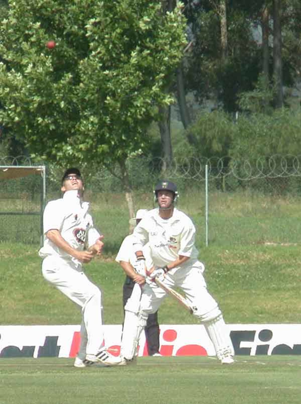 WP opening batsman Andrew Puttick watches as the ball loops in the direction of the Boland short leg fielder Wiaan Smit