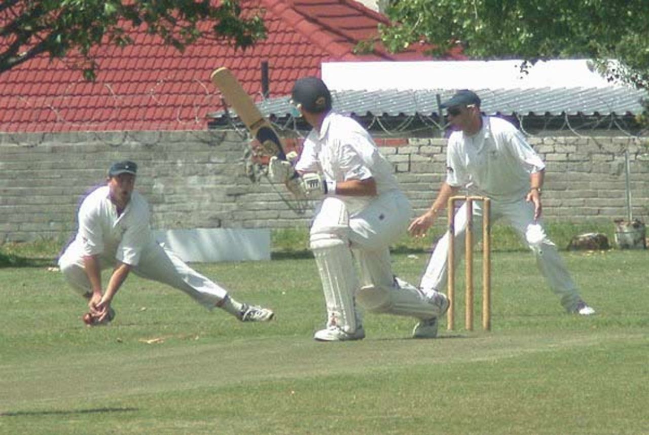 Steve Mendes of Almar has a narrow escape as he edges a ball to CTGP's Jason Bird at 2nd slip. Looking on is 1st slip Donnie Henry.