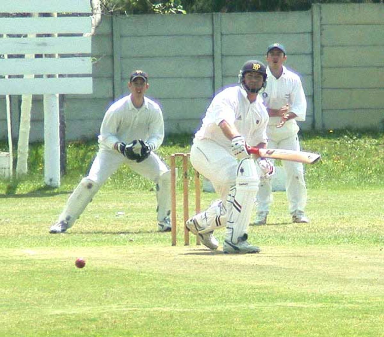 Almar's Ryon Maron turns a ball to the leg side. The wicketkeeper is Kevin Kotze and Donnie Henry is at slip.