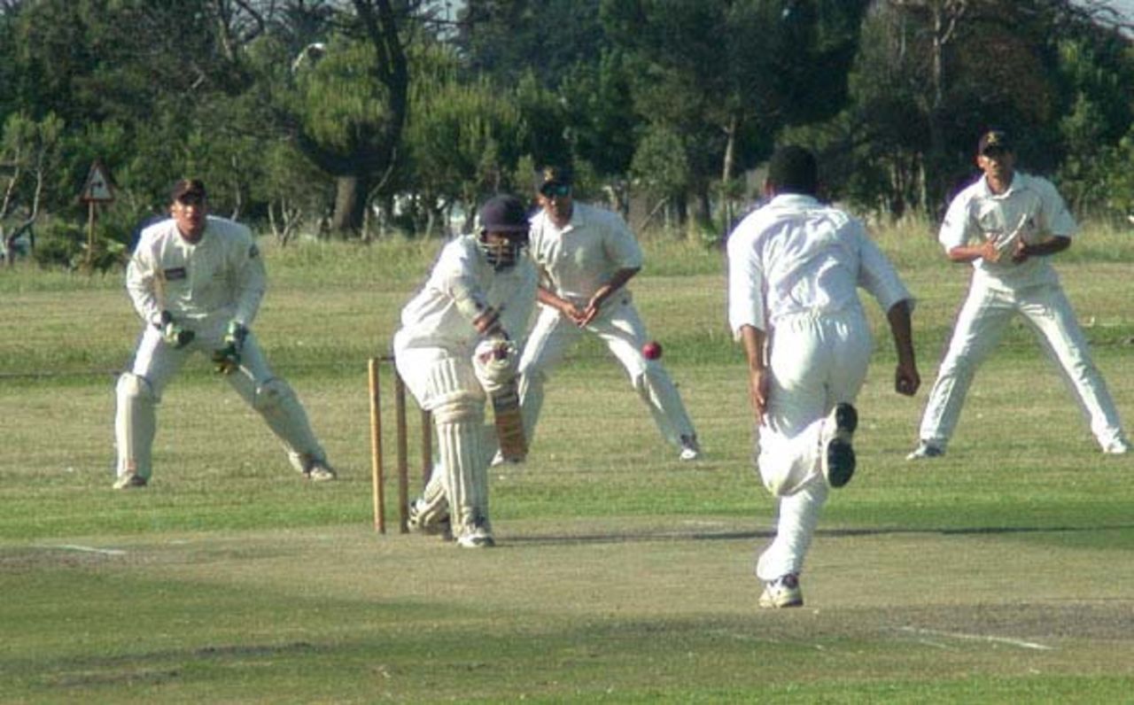 Mzwaneke Tsolekile plays a forward defensive shot to a delivery from Victoria's Vivian Veldsman. The wicketkeeper is Warren Wyngaard. The slips are Nazeem White(1st) and Mark de Stadler(2nd).