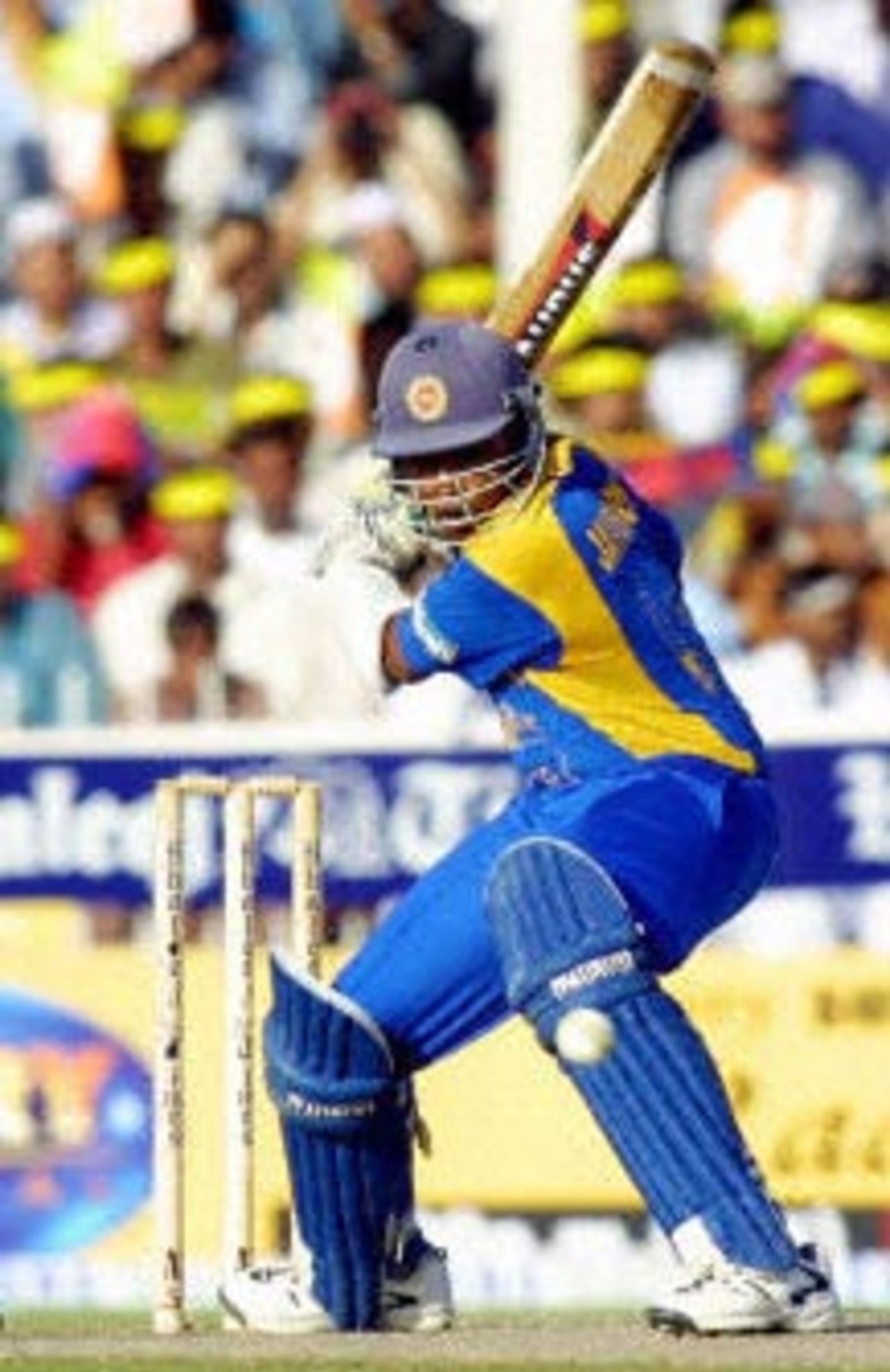 Sri Lankan bastman Mahela Jayawardene hits the ball during their Cricket match in Sharjah 04 November 2001,