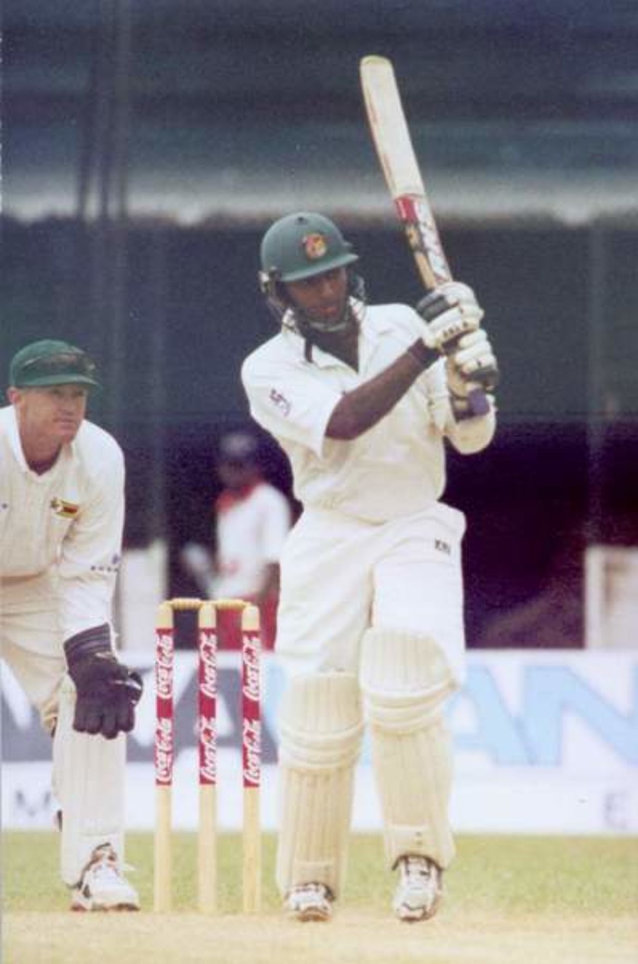 Javed Omer hits the ball in perfection