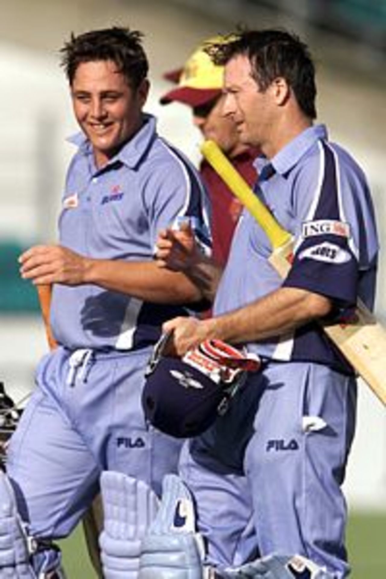 18 Nov 2001: Mark Higgs (63) and Steve Waugh (101) of NSW celebrate their victory in the ING Cup match between the NSW Blues and the Queensland Bulls held at the Sydney Cricket Ground, Sydney, Australia. The Blues won the match by 5 wickets.