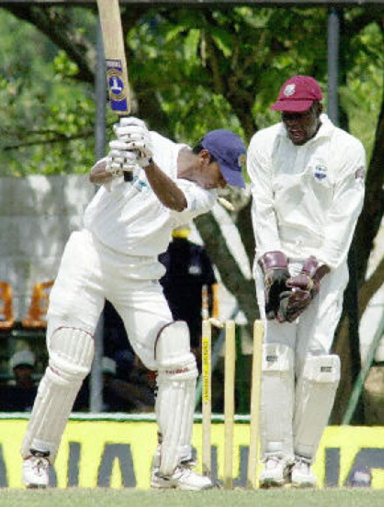 Kumar Sangakkara is seen being bowled by Ramnarine during the second Test match between Sri Lanka and West Indies at Asgiriya Stadium in Kandy