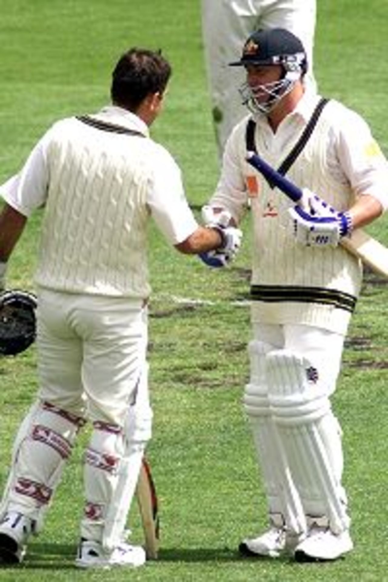 23 Nov 2001: Ricky Ponting of Australia is congratulated by team mate Shane Warne on his century during day two of the second test between Australia and New Zealand played at Bellerive Oval, Hobart, Australia.
