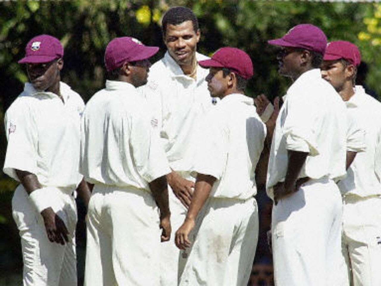 Mervyn Dillon celebrates with teamates after taking the wicket of Sri Lankan batsman Kumar Sangakkara