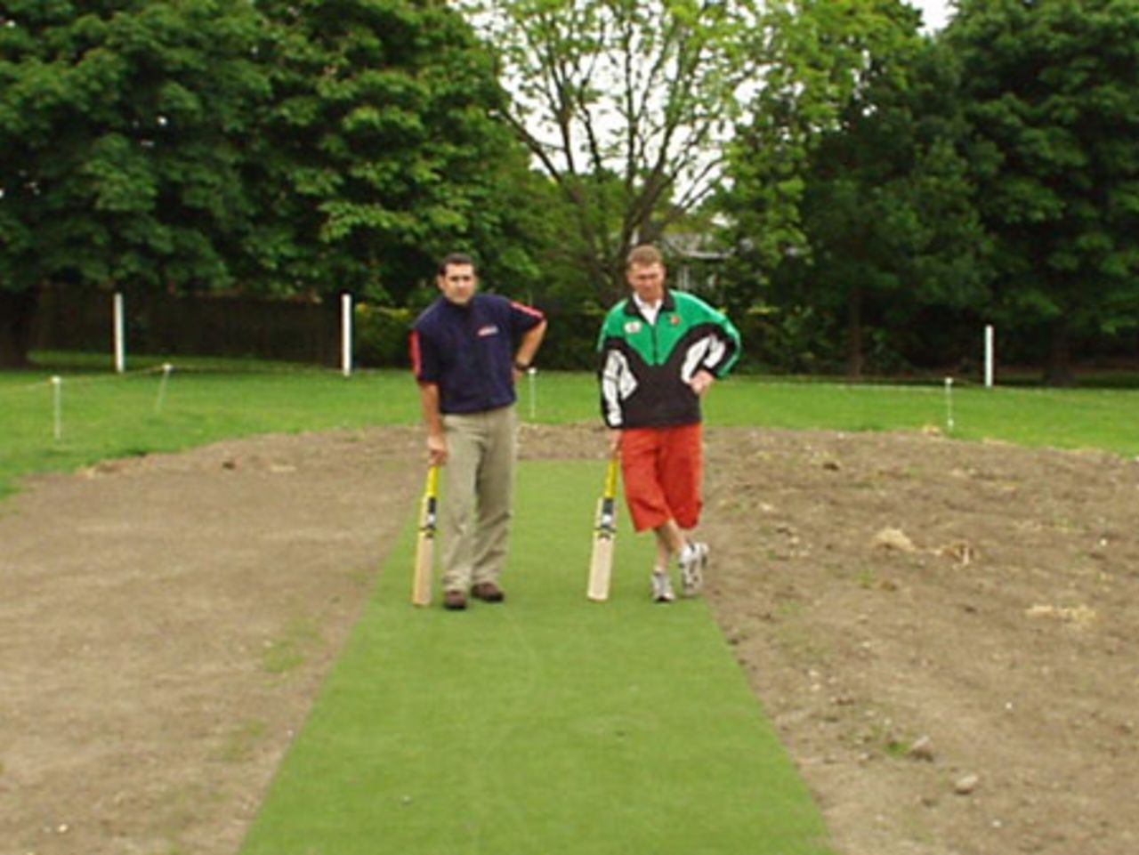Doug McSweeney (left) and Mike Harvey from the Canterbury Cricket Association at Thorrington Primary School's new artificial pitch, laid through the CCA Artificial Plan.