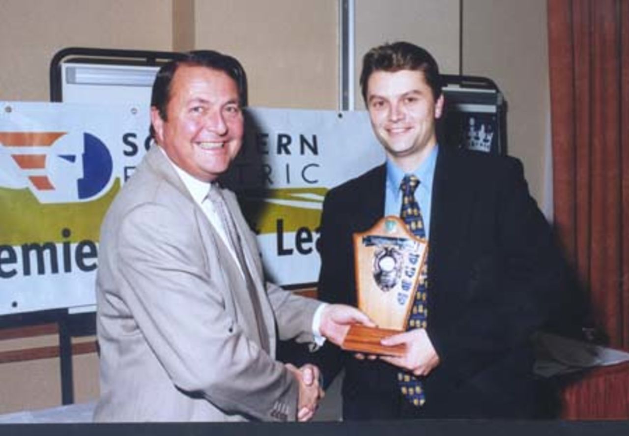 Southern Electric IT manager Barry Williams, presents Duncan Berry captain of Liphook & Ripsley with the fair play award.