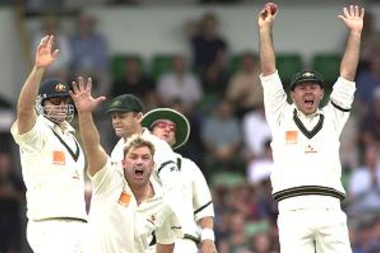 30 Nov 2001: Shane Warne and Ricky Ponting of Australia appeal with team mates unsuccessfully for a catch off Stephen Fleming of New Zealand during day one of the Third Test between Australia and New Zealand, played at The WACA, Perth, Australia.