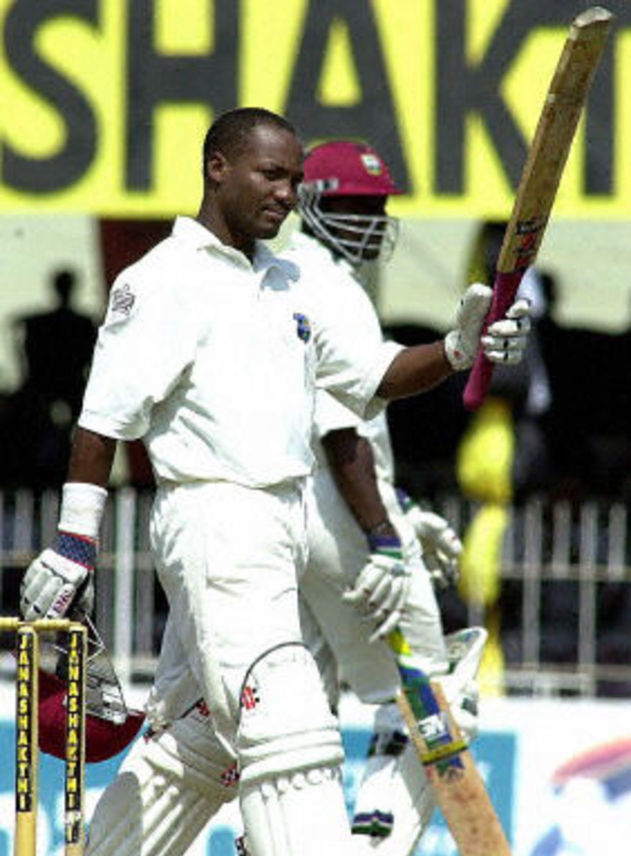 Brian Lara acknowledges the crowd after completing his double century