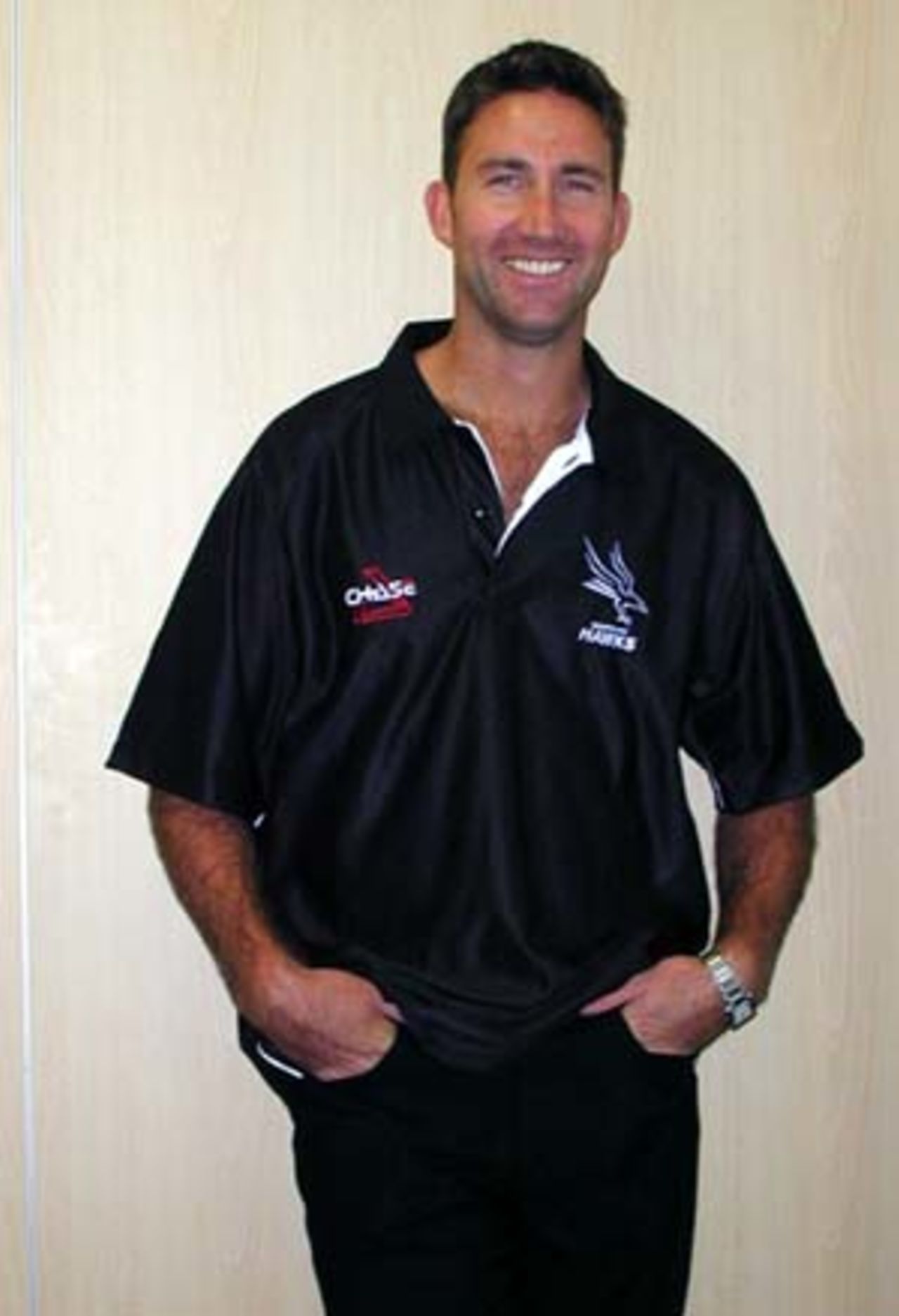 Ed Giddins relaxes in his new Hampshire Hawk shirt