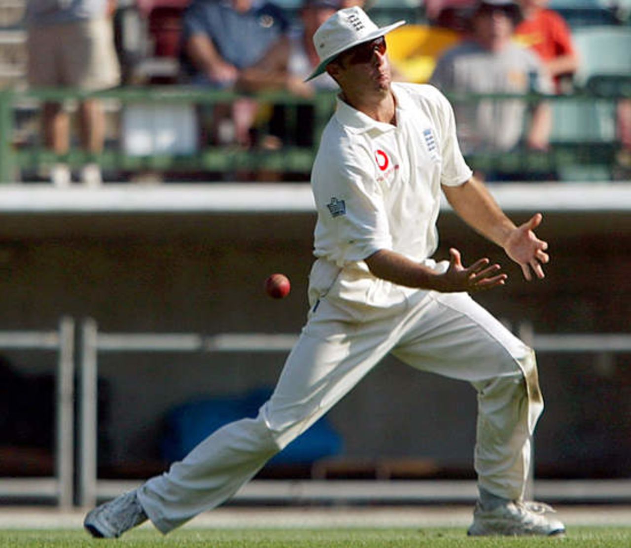 England's Michael Vaughan drops a catch off Australia's Matthew Hayden during the first day's play in the first Ashes test match against England at the Gabba in Brisbane November 7, 2002.
