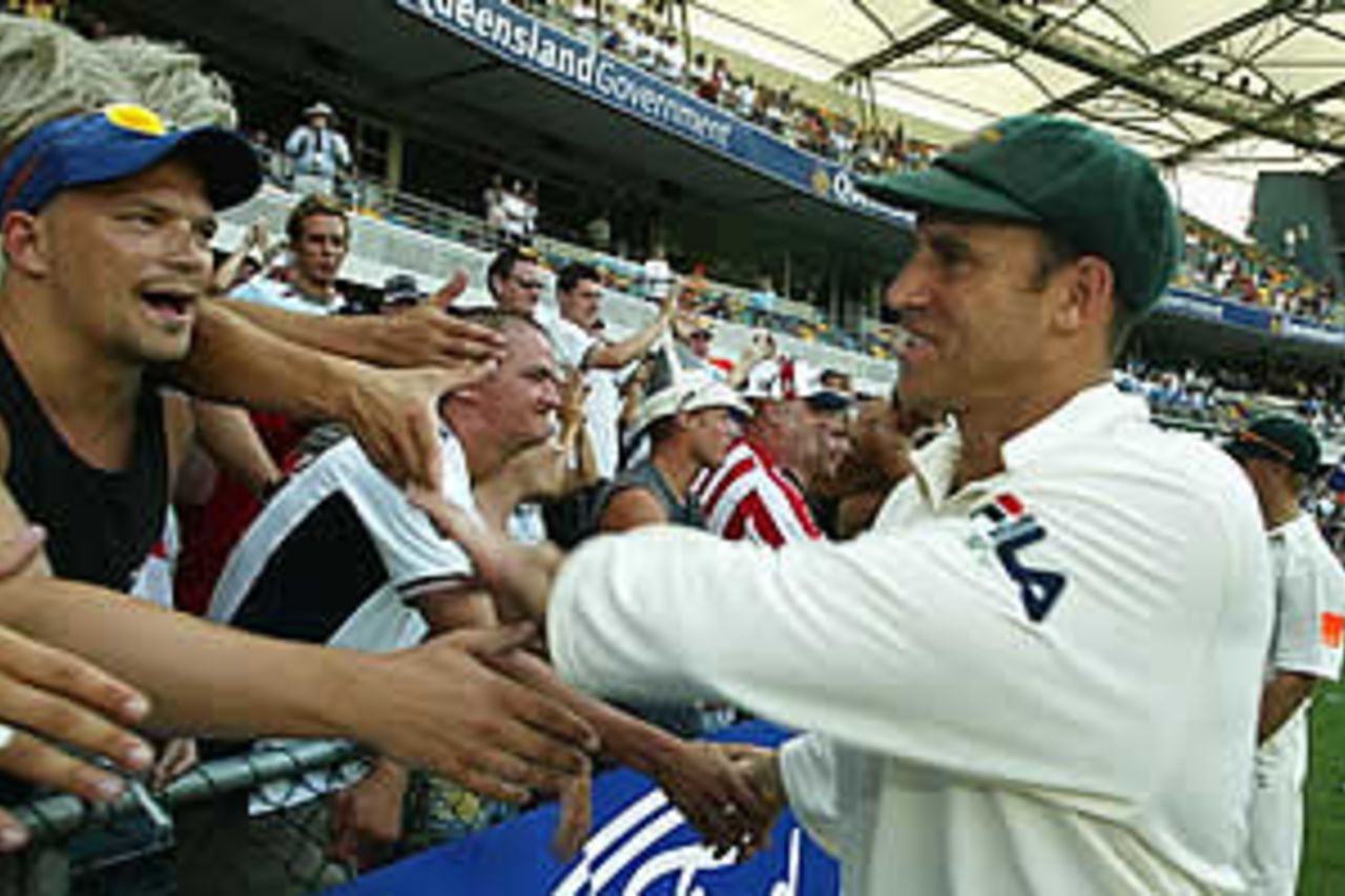 BRISBANE - NOVEMBER 10: Matthew Hayden of Australia celebrates with the Gabba crowd after day four of the first Ashes Test between Australia and England at the Gabba in Brisbane, Australia on November 10, 2002.
