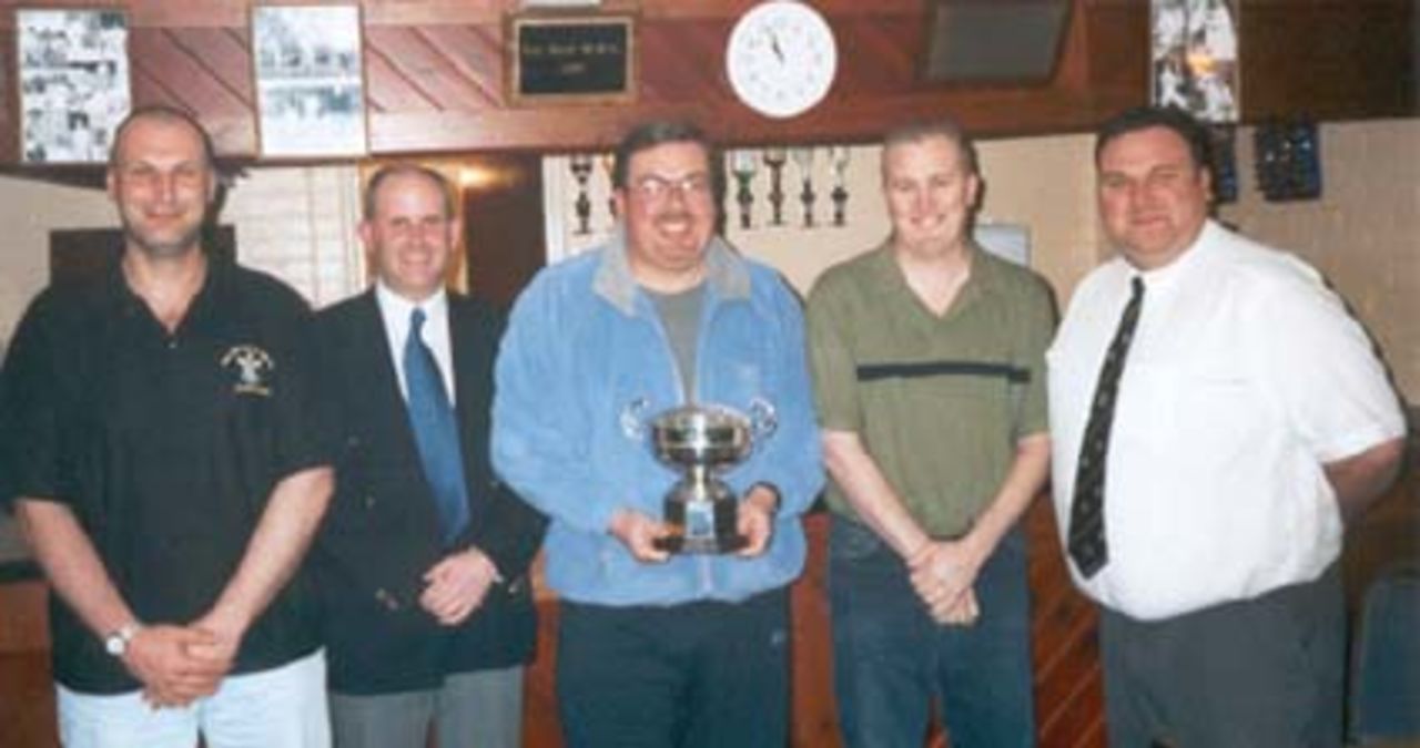 Aldershot - The winners of the 2002 HCL Quiz<br>(pictured with the quiz master Richard Issacs)