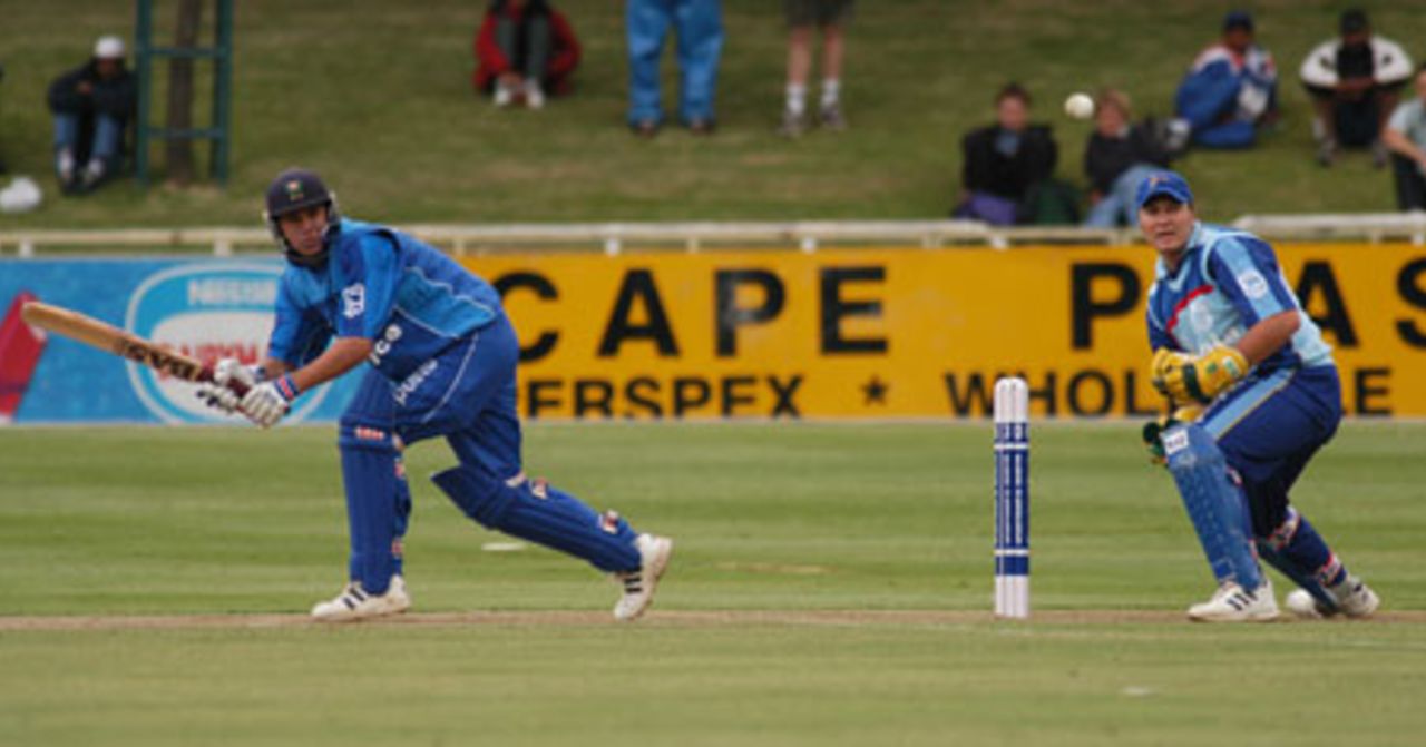 Renier Munnik glances a delivery to leg with Namibian Vipers's wicketkeeper Morne Karg looking on