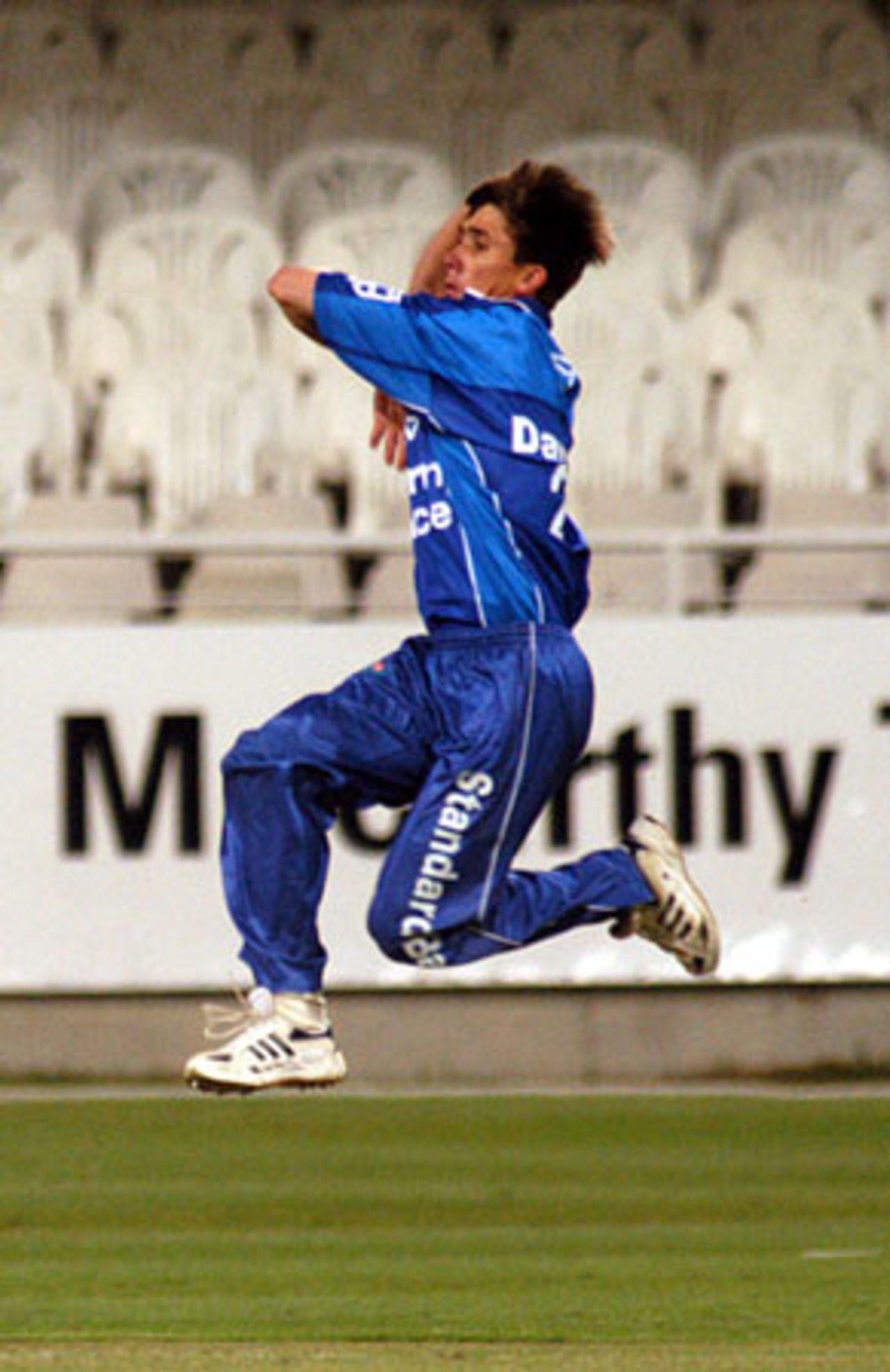 Alan Dawson in full flight against Namibia, he took 5 wickets