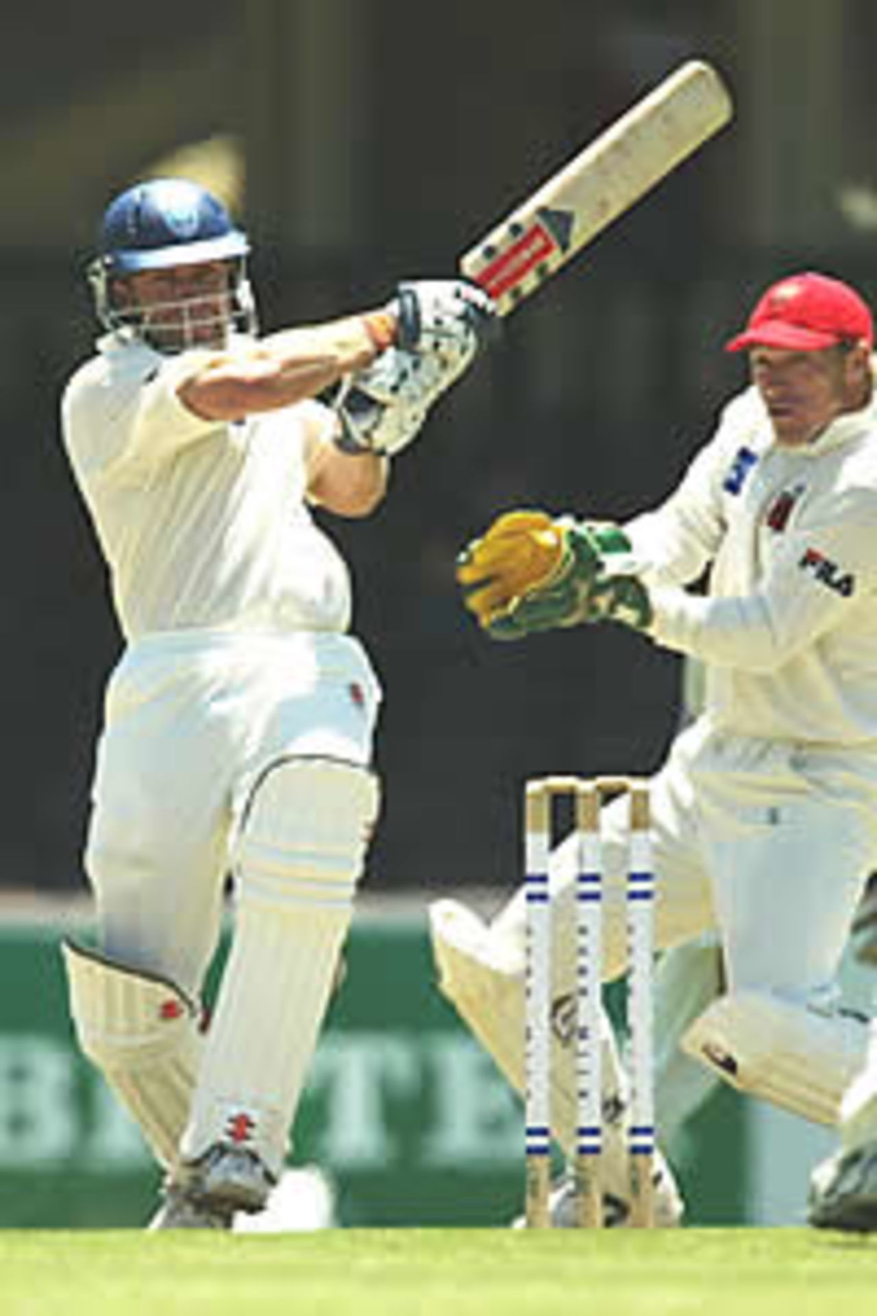 SYDNEY - NOVEMBER 17: Michael Slater of New South Wales hits out during day four of the Pura Cup Match between the Southern Redbacks and the New South Wales Blues at the Sydney Cricket Ground in Sydney, Australia on November 17, 2002.