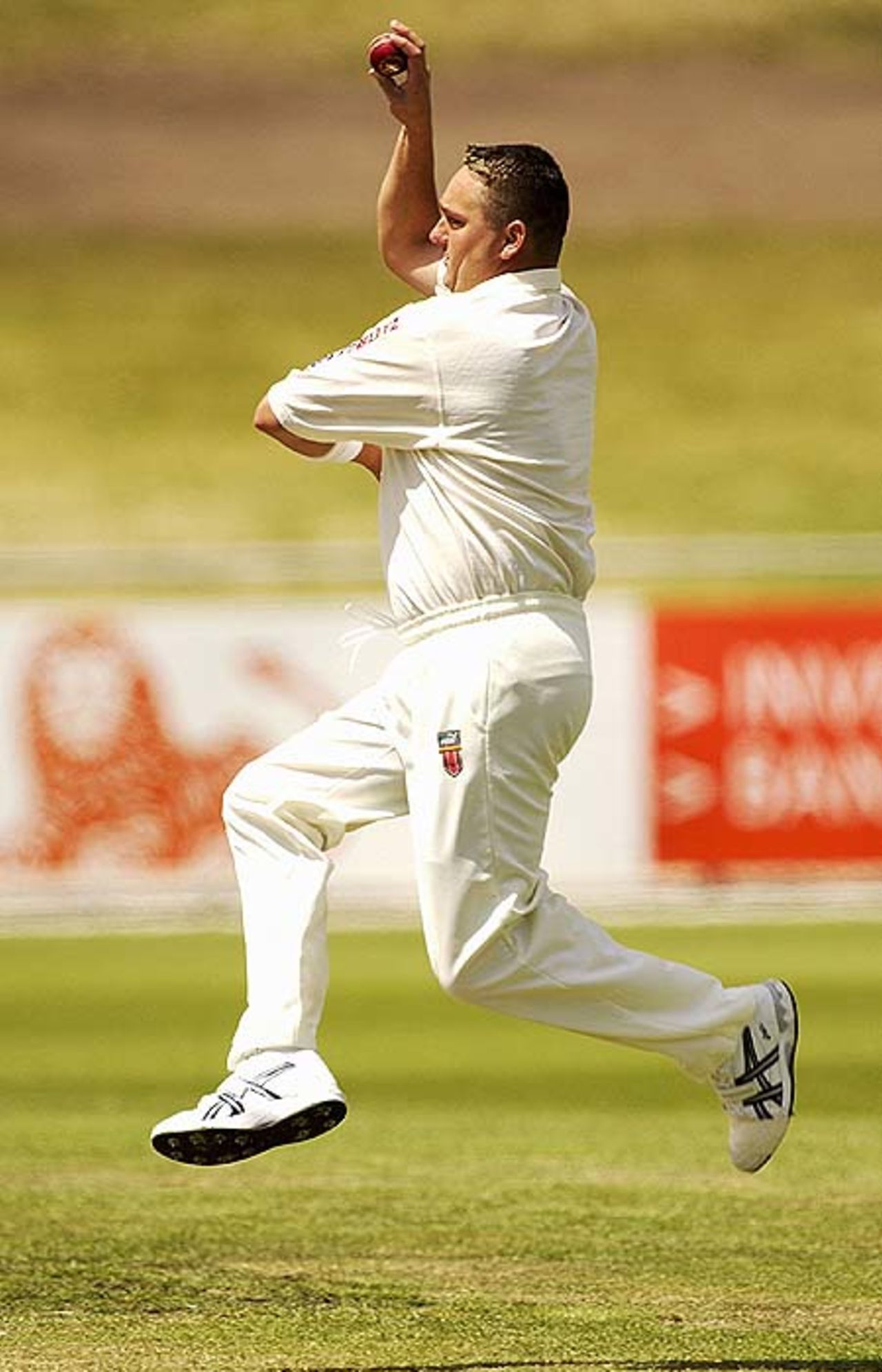 HOBART - NOVEMBER 23: Don Nash of the Blues about to bowl a delivery during the second day of the Pura Cup match between the the Tasmanian Tigers and the New South Wales Blues played at the Bellerive Oval, Hobart, Australia on November 23, 2002.