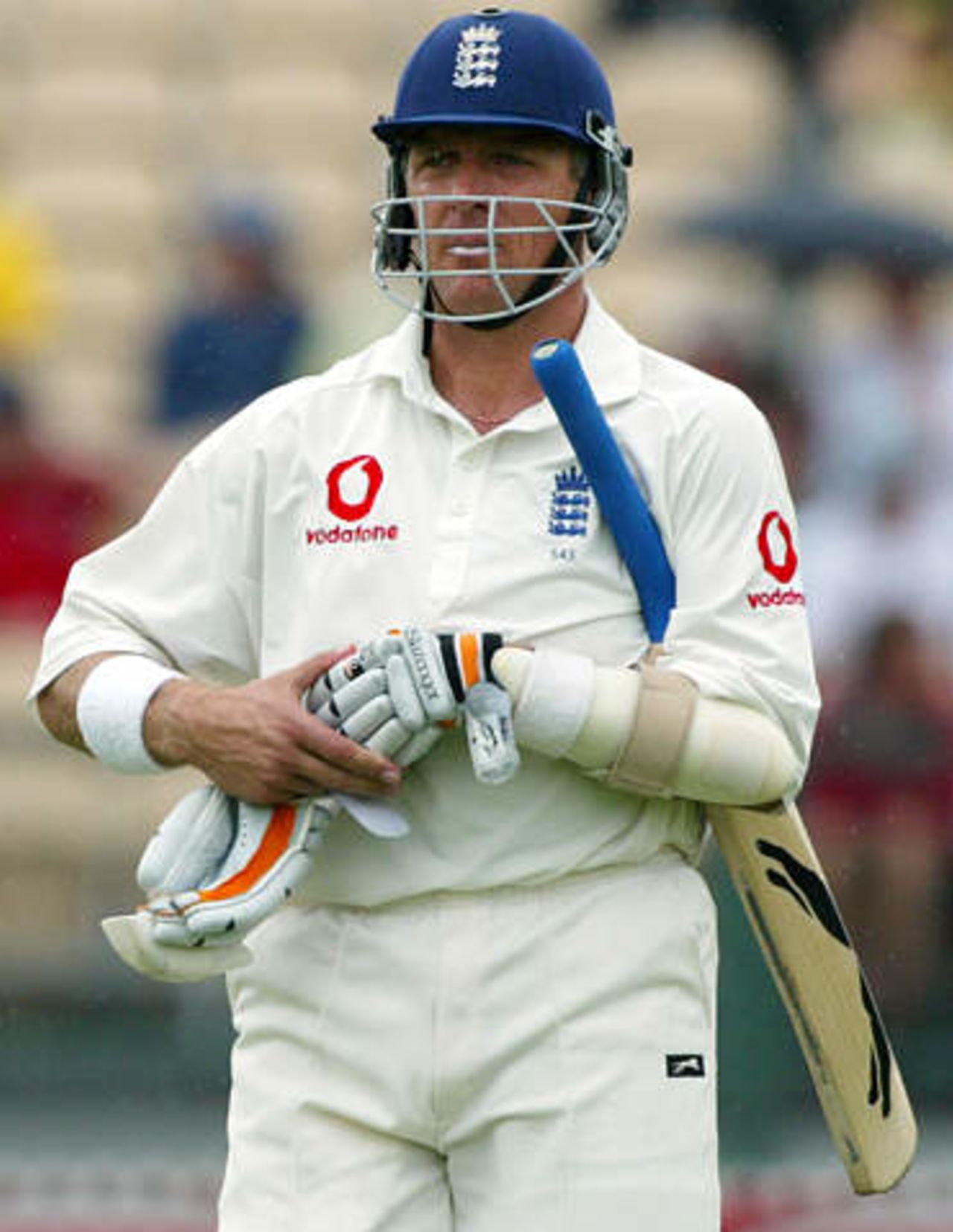 England's Alec Stewart walks from the field in Adelaide after being dismissed for 57, second Ashes Test, 24 Nov 2002