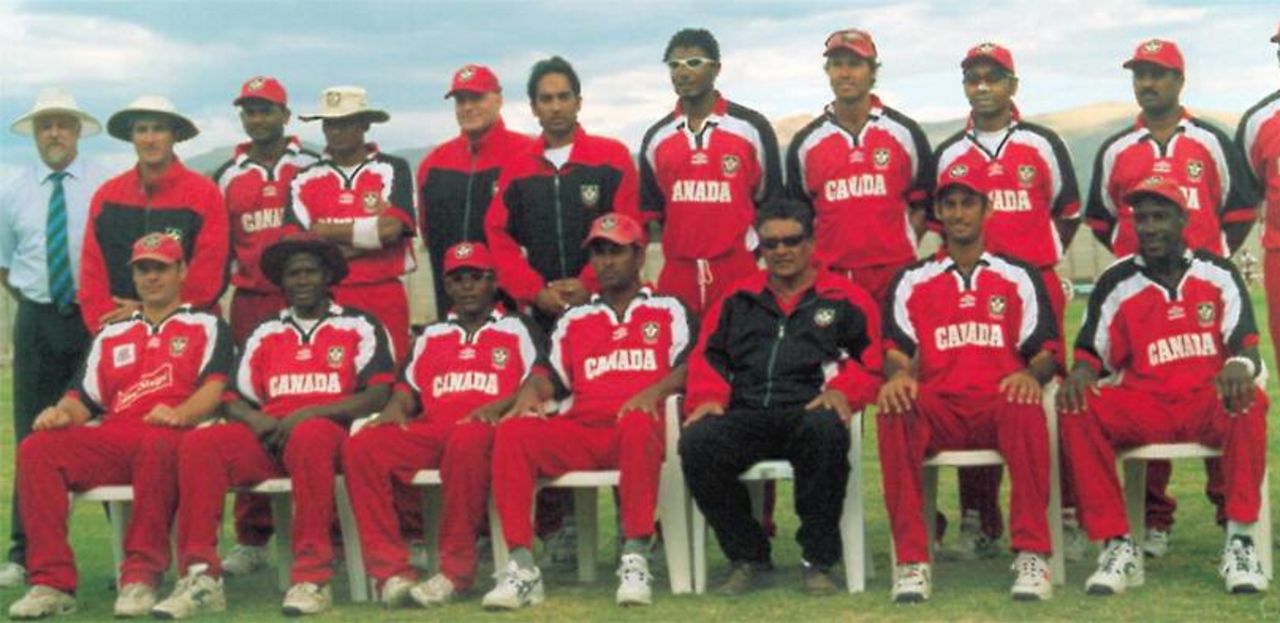 Canadian team in Namibia; from l-r, back row. Match umpire Brian Catt, Jeff Thomas, Asish Patel, Ishwar Maraj, Milton Bingham (physio), Muneeb Diwan, Austin Codrington, John Davison, Ashish Bagai, A Samad, Sanjayan Thuraisingam. Front: Ian Billcliff, Desmond Chumney, Nick De Groot, Joe Harris, Karam Gopaulsingh, Barry Seebaran, Davis Joseph